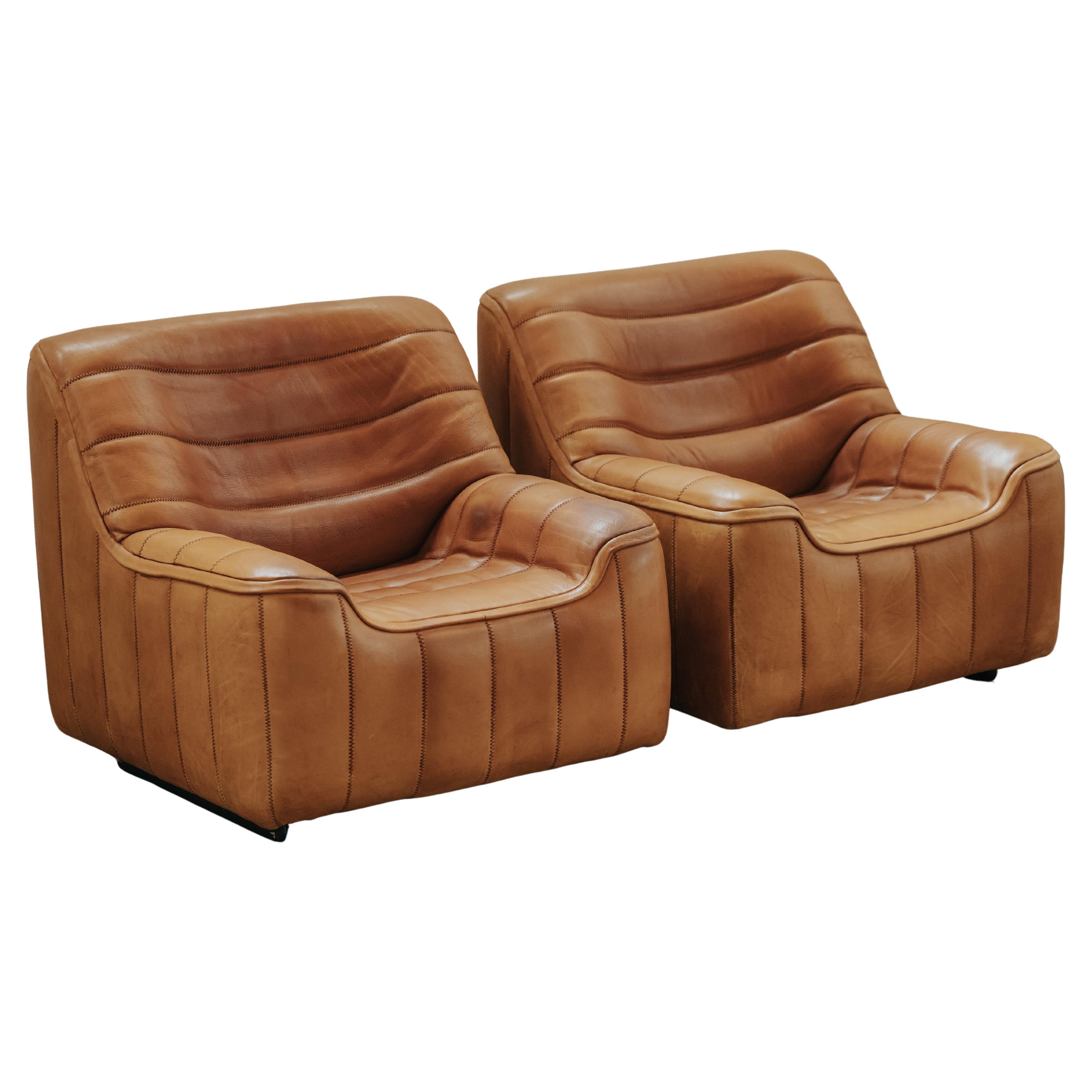 Pareja vintage de sillones de cuero DS-84 de De Sede, Suiza, años 70