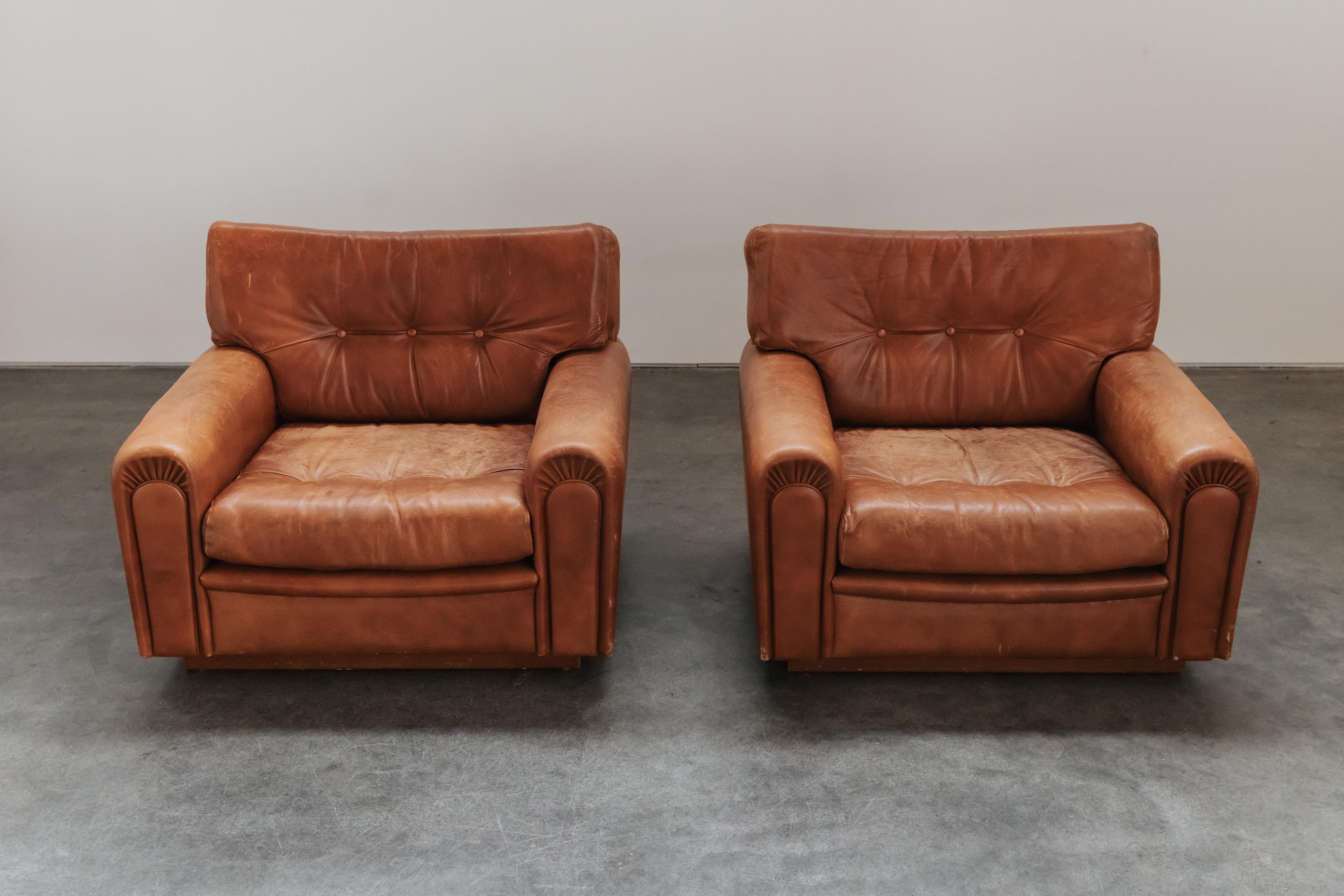 Vintage Pair Of Leather Lounge Chairs By OPE, From Sweden, Circa 1970.  Very comfortable model with original brown leather upholstery.  Great patina and use.  