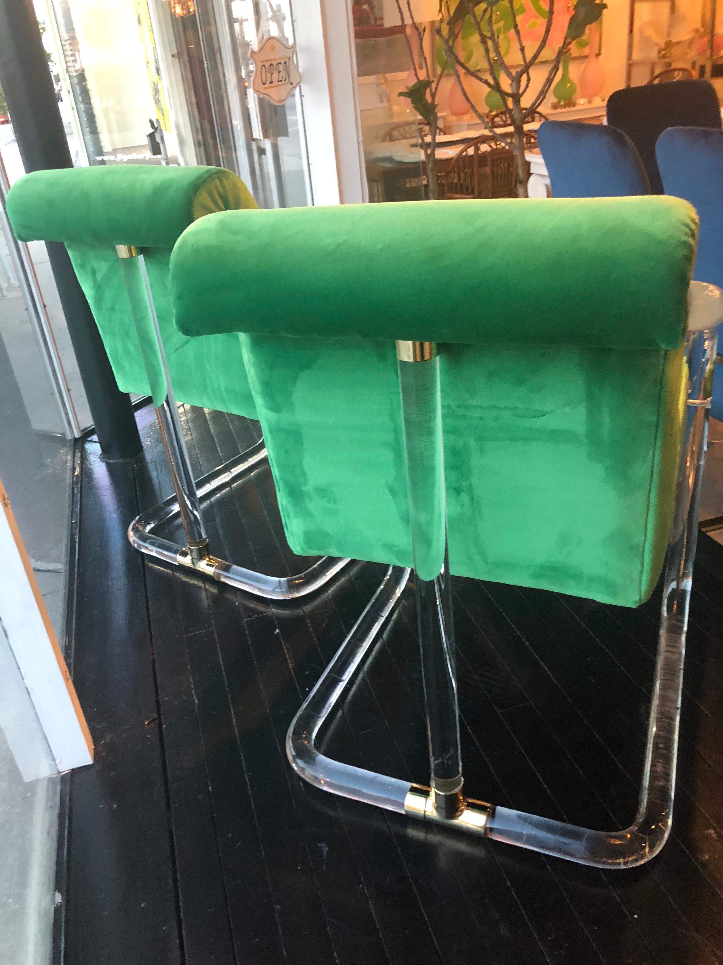 American Vintage Pair of Lion in Frost Signed Lucite and Brass Arm chairs Green Velvet