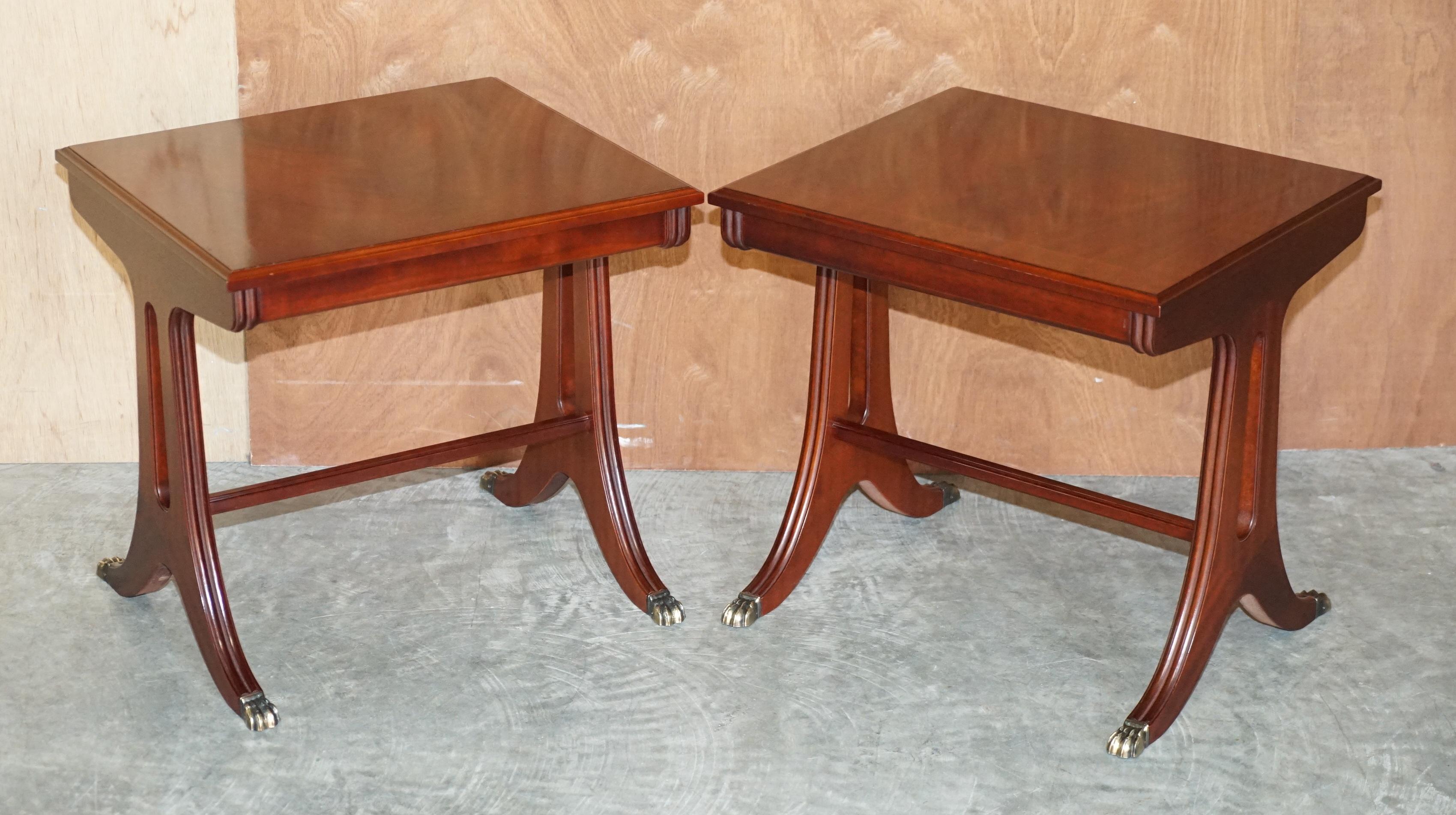 We are delighted to offer for sale this lovely pair of tables which have flamed mahogany tops and lions hairy paw brass feet

A very good looking and well made pair, the timber patina to the top is very nice, the feet offer a touch of style and