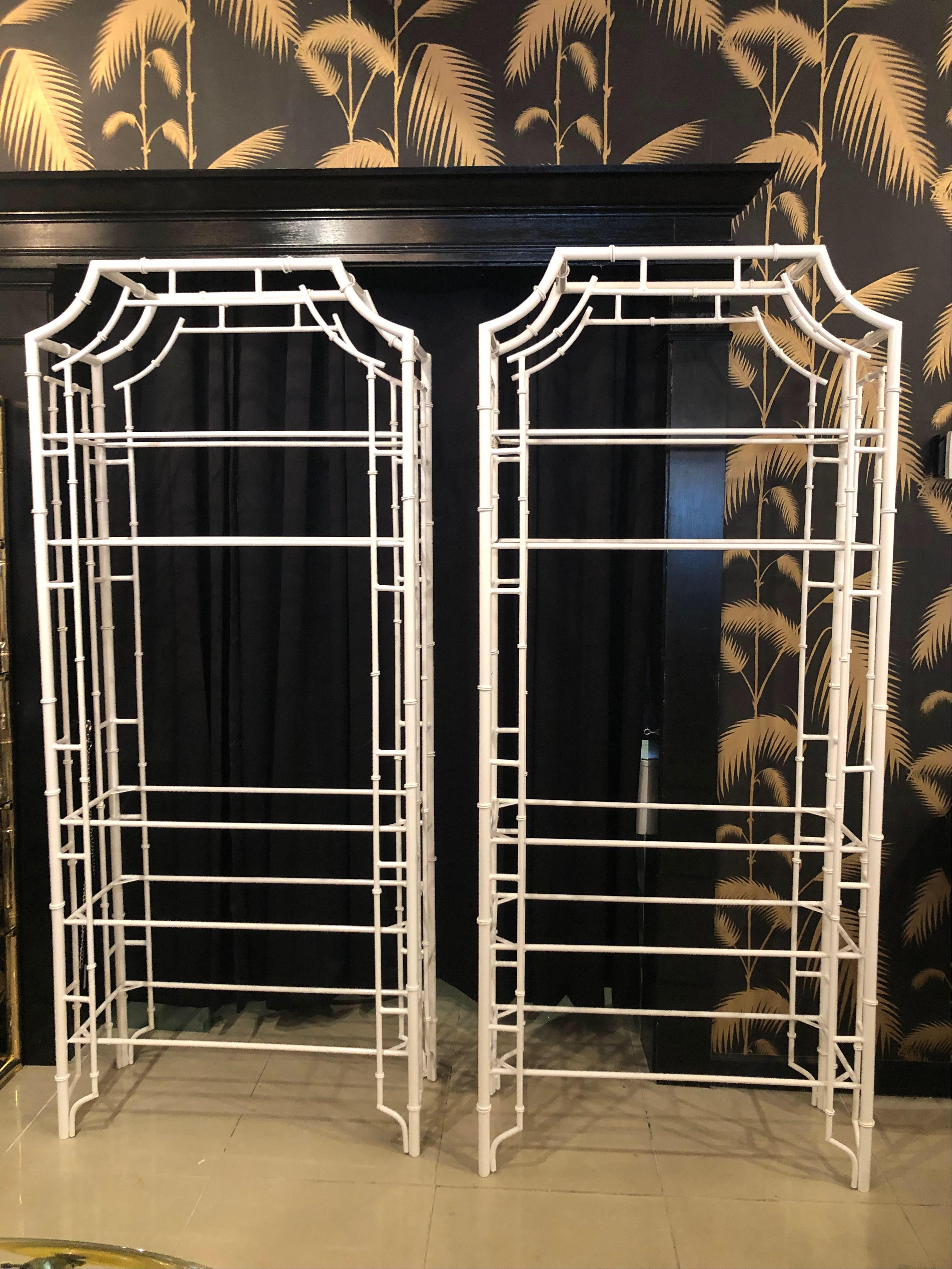 Amazing pair of vintage faux bamboo, Chinese Chippendale metal, newly powdercoated, pagoda etageres. Includes all new cut glass shelves, 5 per etagere. These are very sturdy, heavy and solid.