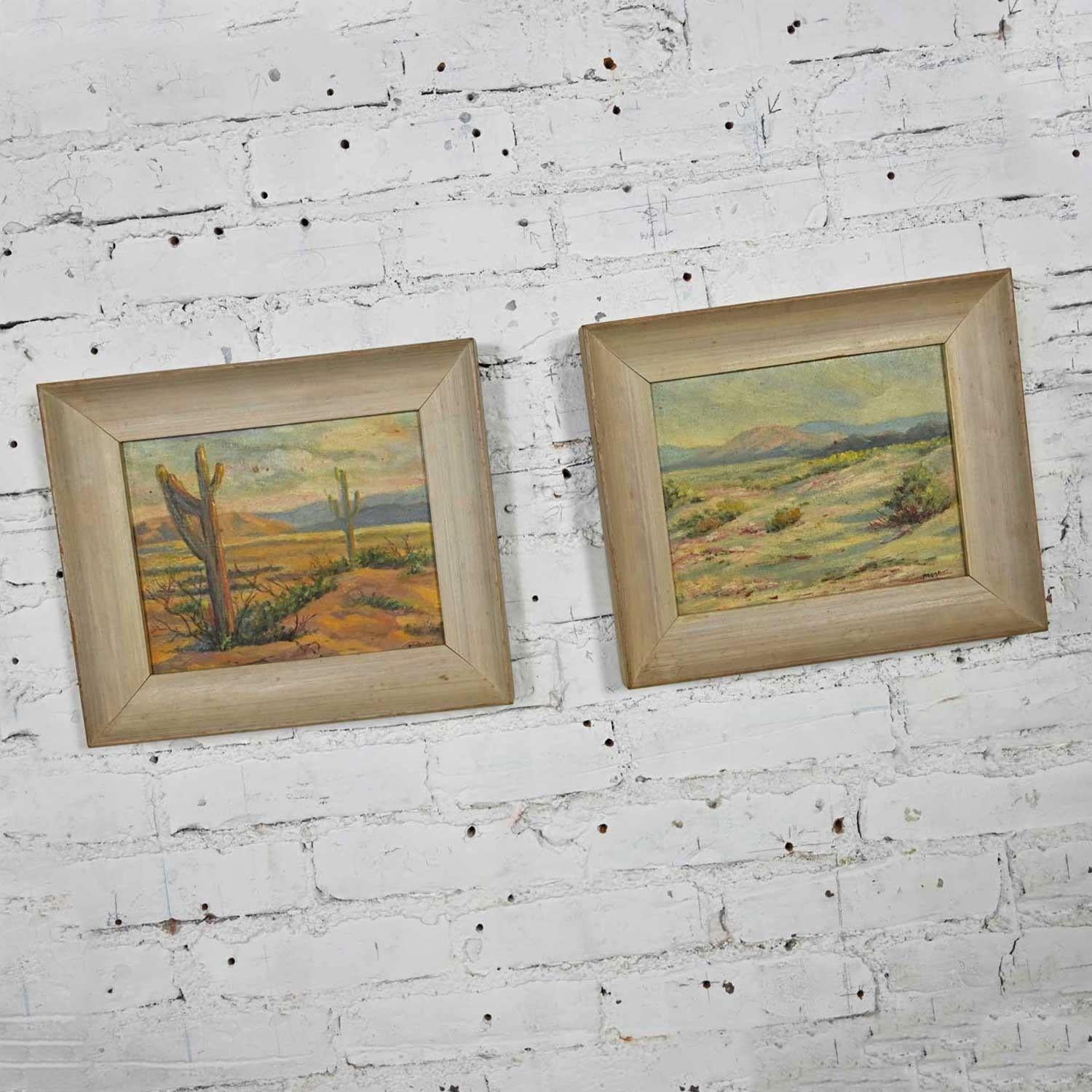 Gorgeous pair of mid-century California desert oil paintings by H. Meade in pickled wood frames. Beautiful condition, keeping in mind that these are vintage and not new so will have signs of use and wear. They are yellowed from age so could benefit