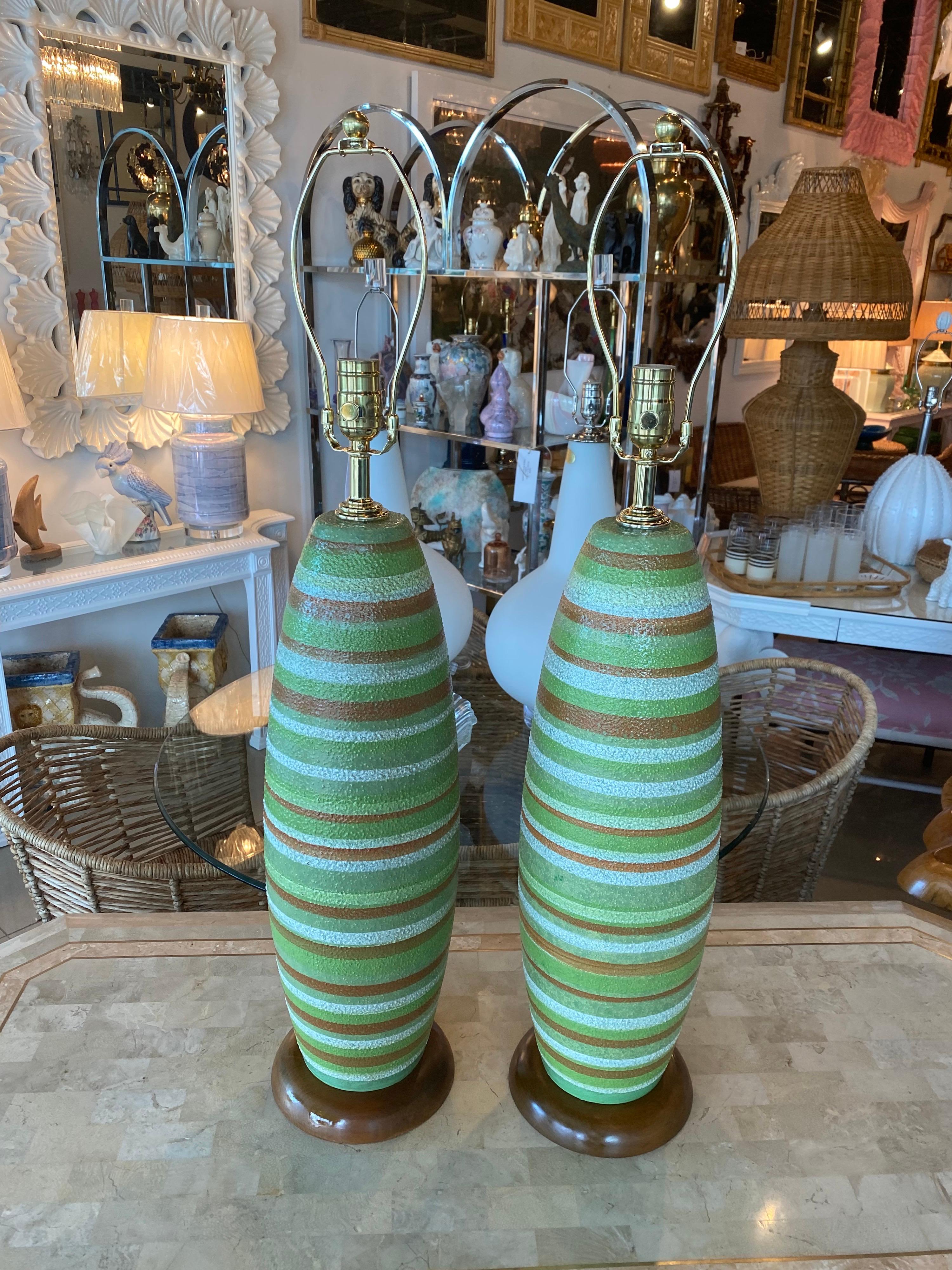 Wonderful pair of vintage Mid-Century Modern stripe green and brown table lamps. No chips or breaks. Newly wired, all new brass hardware, 3 way sockets. Dimensions 33 high to finial x 26.5 H to socket x 7 D.