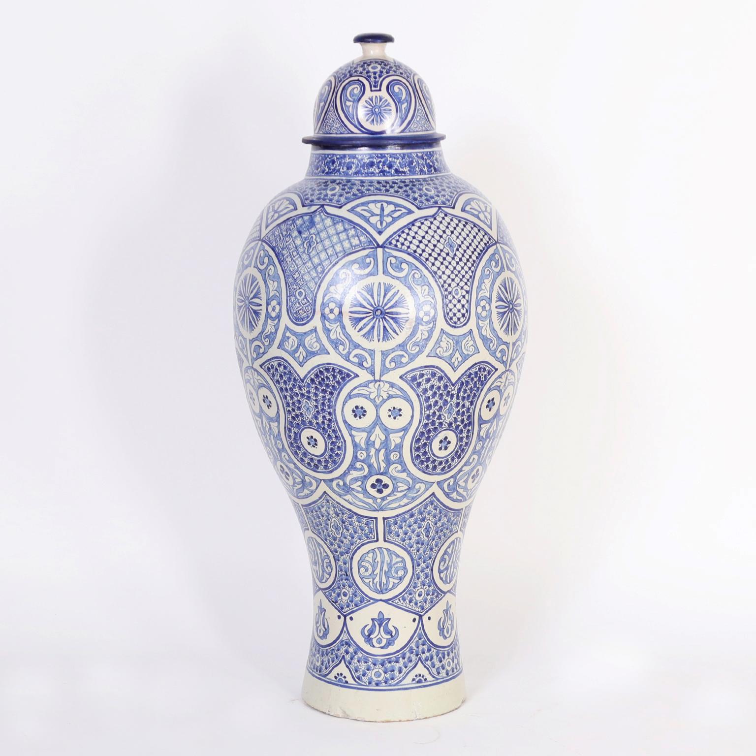 Painted Vintage Pair of Moroccan Blue and White Earthenware Palace Urns For Sale
