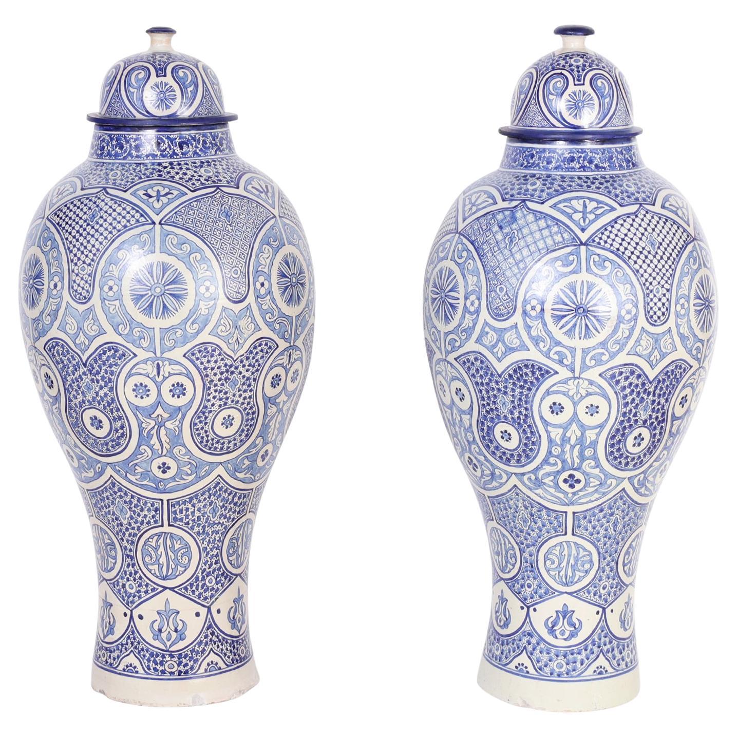 Vintage Pair of Moroccan Blue and White Earthenware Palace Urns For Sale