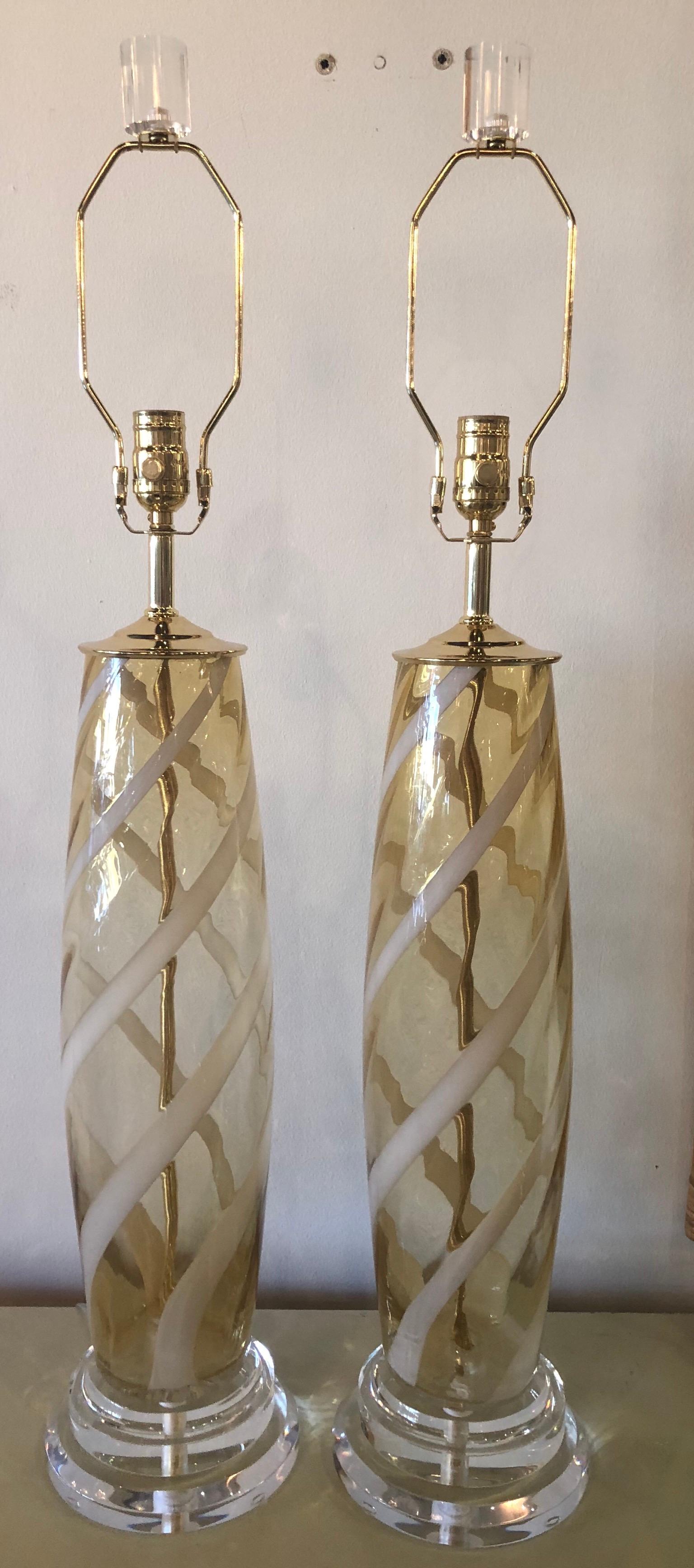 Vintage Italian glass Murano table lamps, pair. These have been newly rewired, new brass hardware, Lucite base and finials. Meticulously restored to perfection!