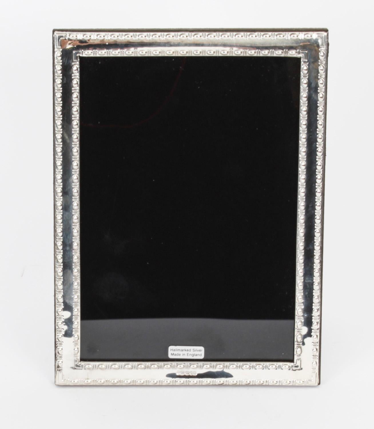 A truly superb pair of Vintage Neo-classical sterling silver photo frames,  by Harry Frane, London Dated  2012.

The beautiful rectangular shaped photo frames are superbly decorated with egg and dart banding.

An excellent gift idea for many
