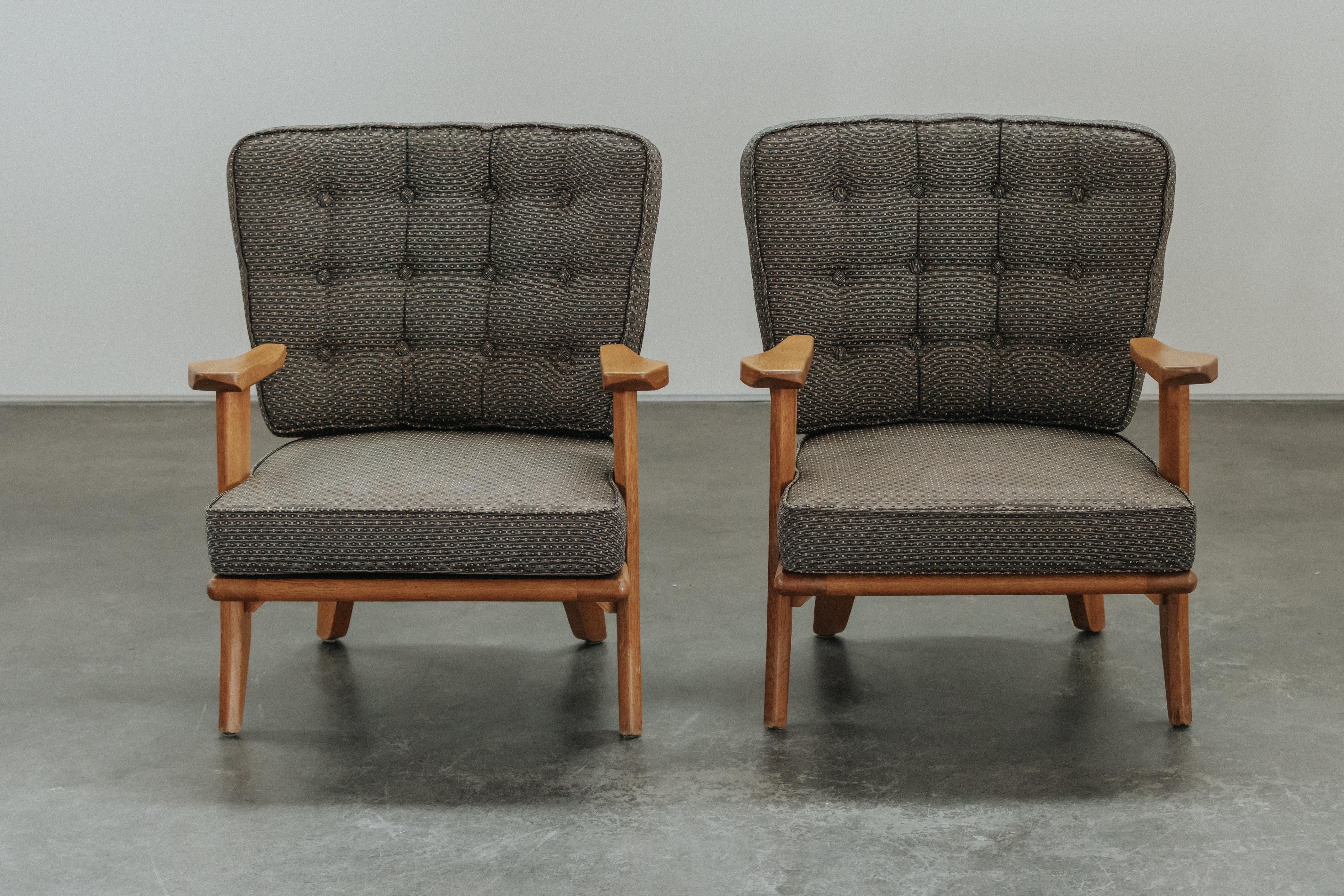 Vintage Pair Of Oak Lounge Chairs By Guillerme Et Chambron, France 1970s.  Solid oak construction with original upholstery.  Very light wear and use.