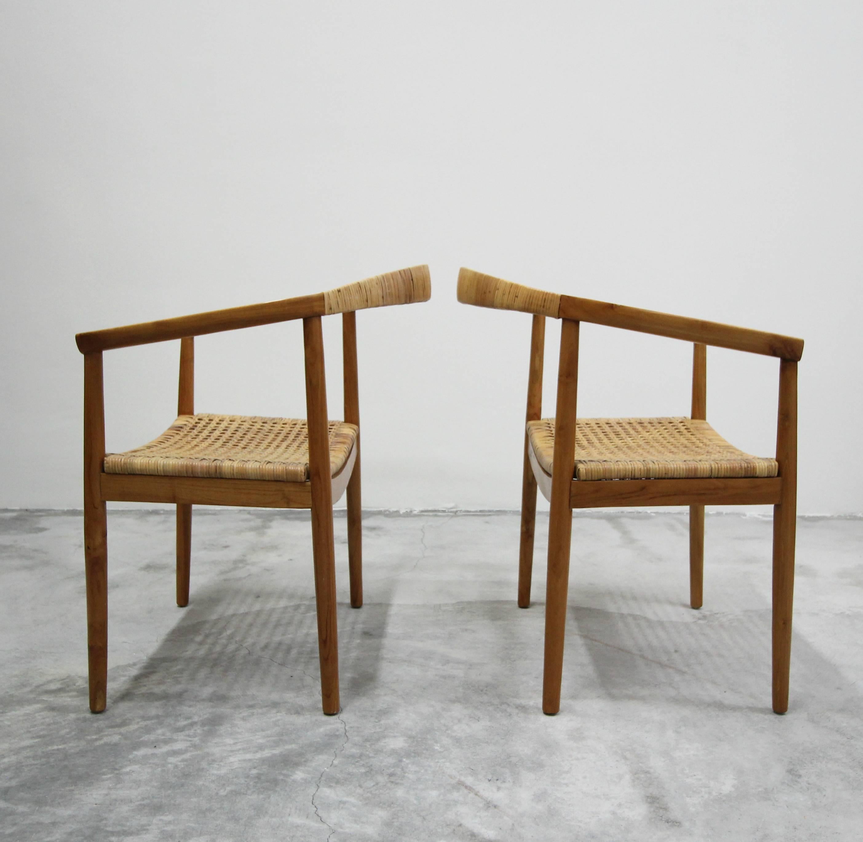 20th Century Vintage Pair of Oversized Danish Style Teak and Cane Round Back Side Chairs