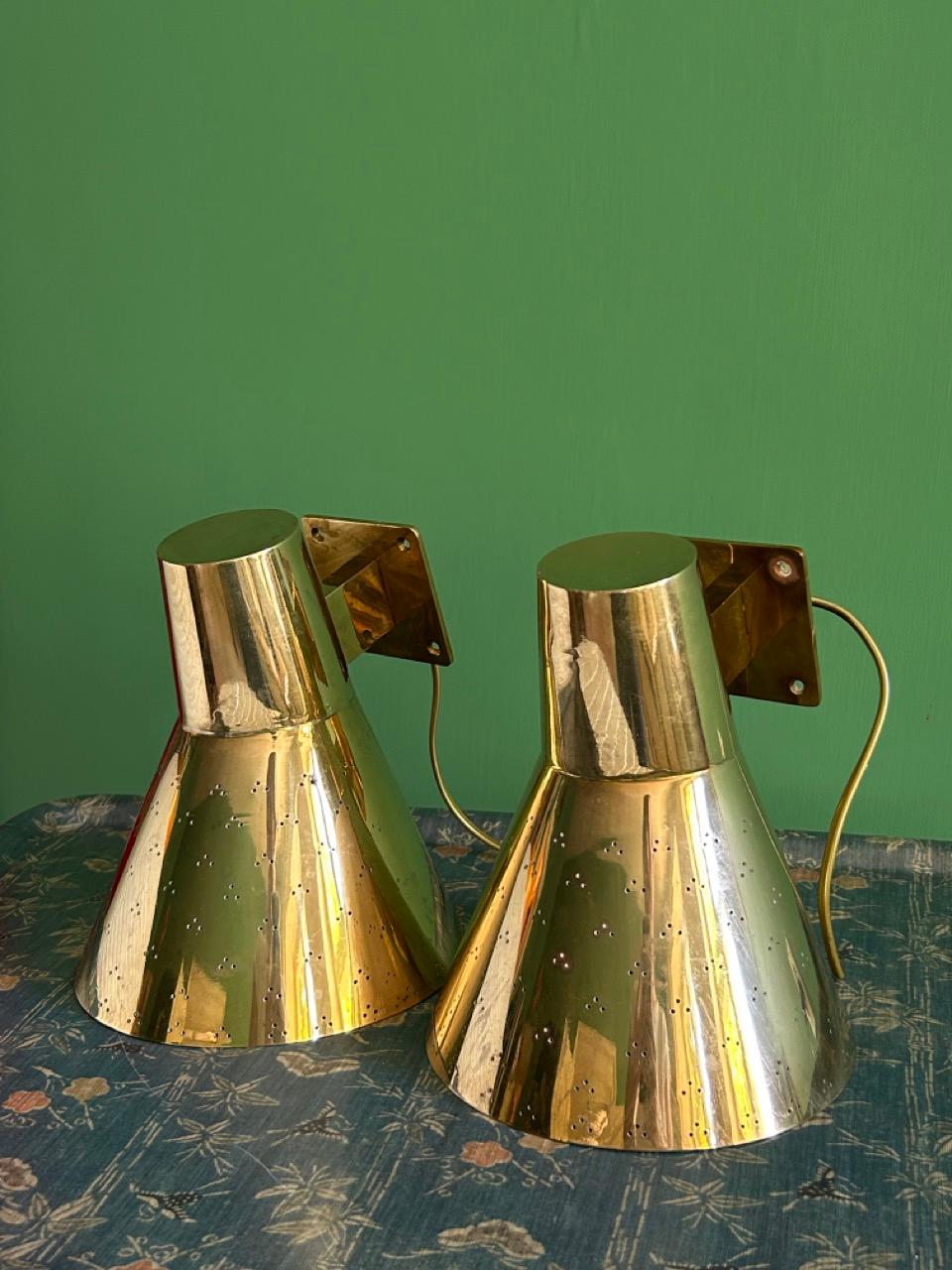 Finnish Vintage Pair of Paavo Tynell Wall Lights in Perforated Brass, Finland, 1950s For Sale