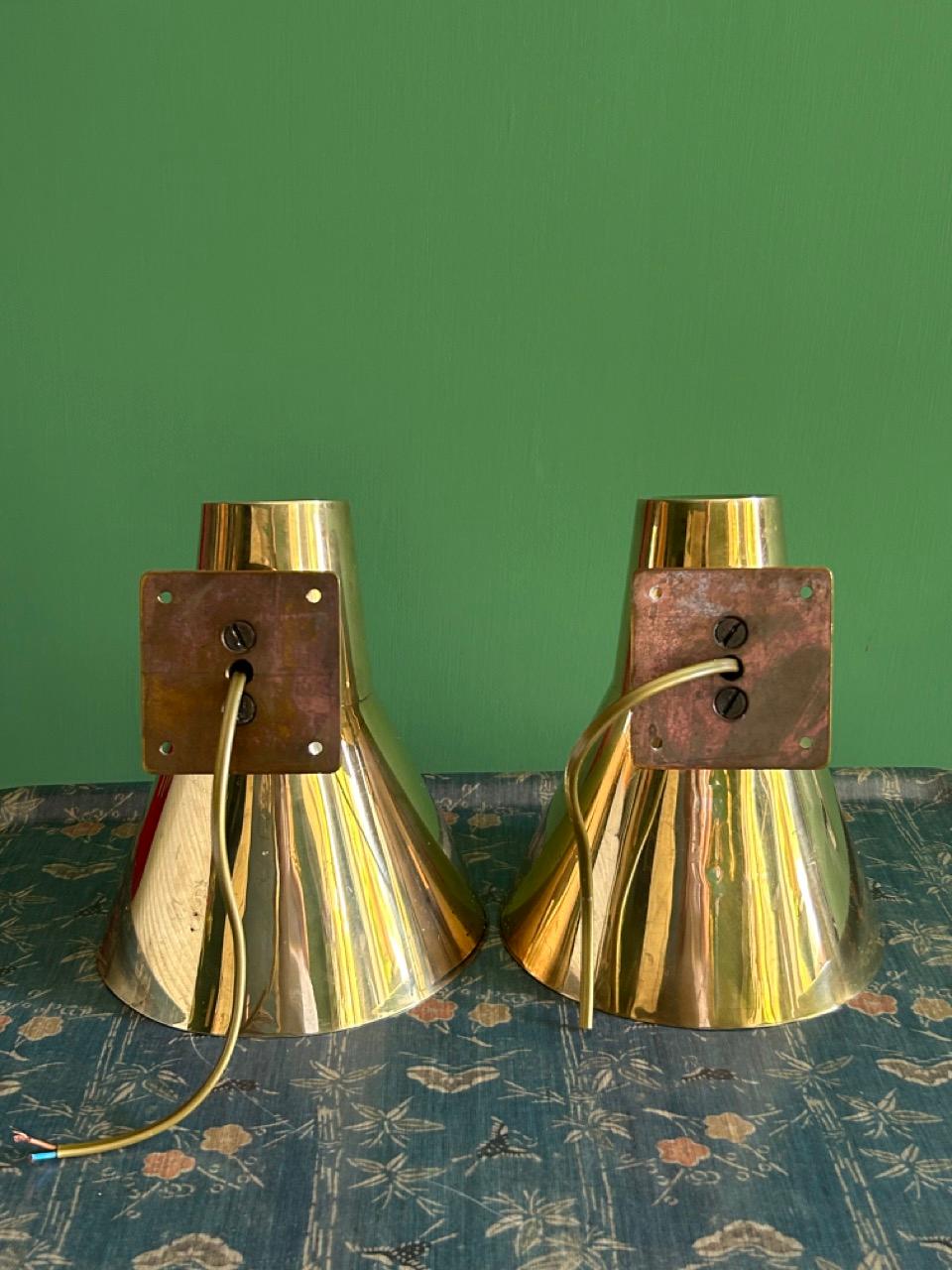 Mid-20th Century Vintage Pair of Paavo Tynell Wall Lights in Perforated Brass, Finland, 1950s For Sale