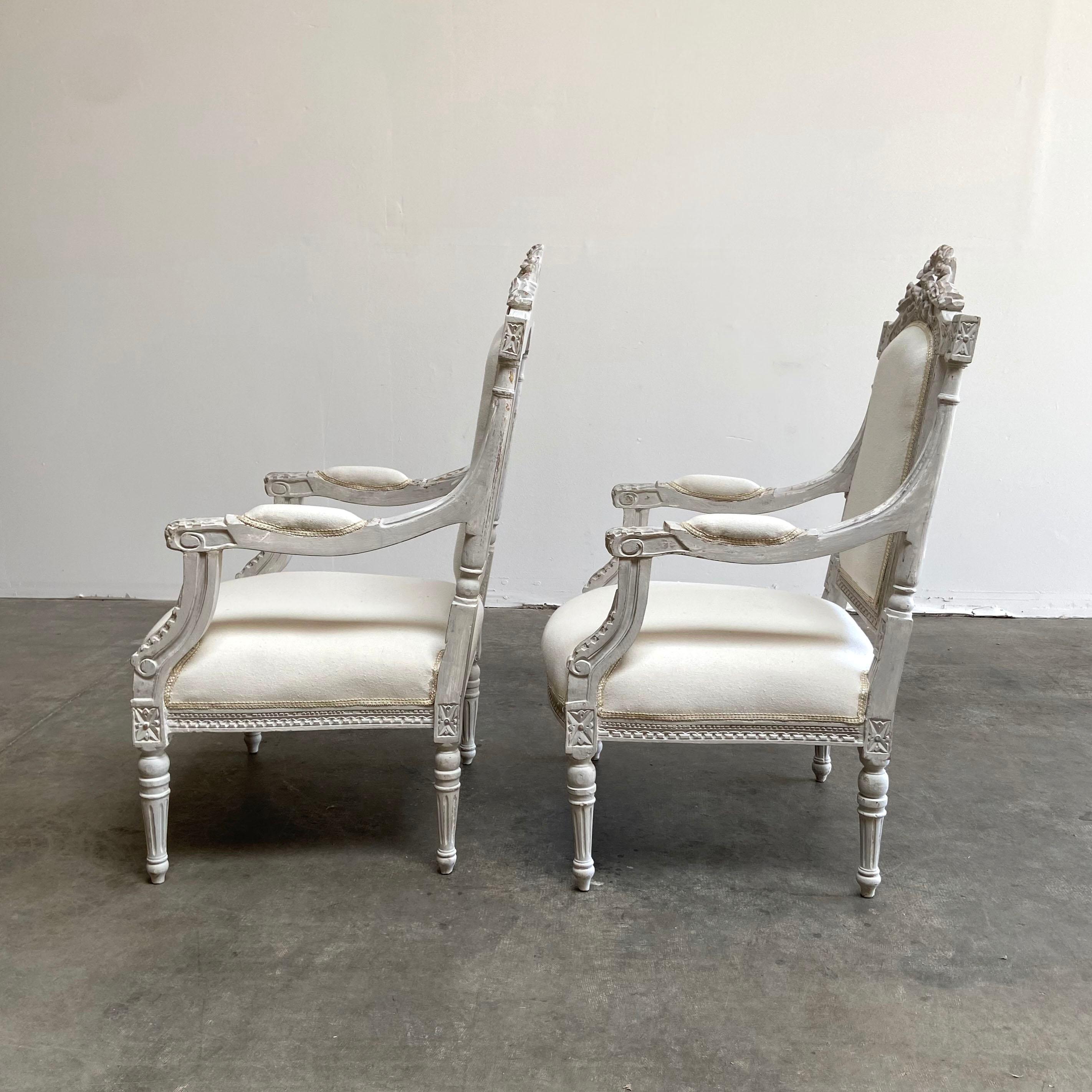 20th Century Vintage Pair of Painted and Upholstered Louis XVI Style Carved Chairs