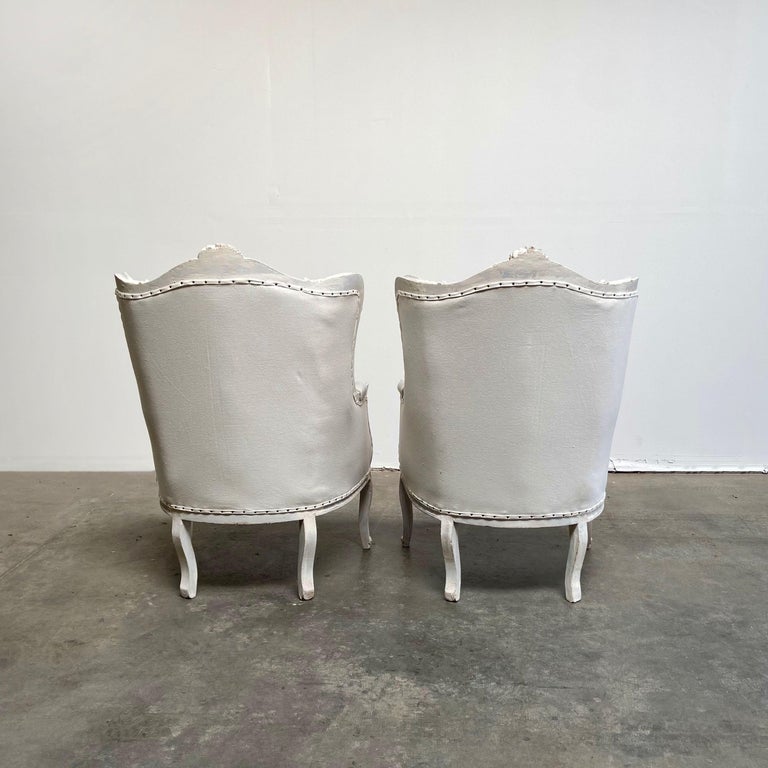 Vintage Pair of Painted French Style Wing Back Bergere Chairs at 1stDibs