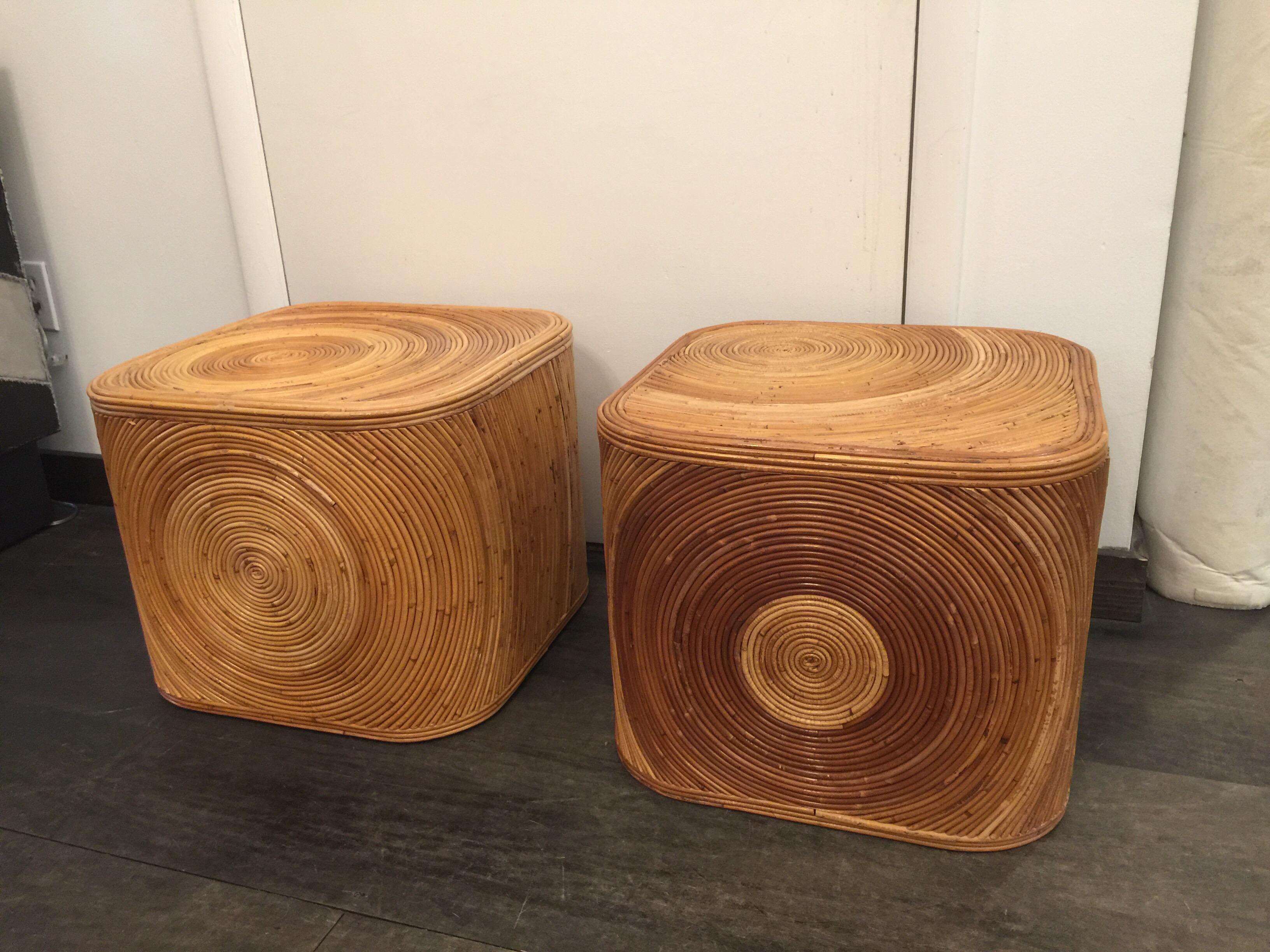 Lovely pair of vintage pencil reed bamboo rattan stools or cocktail, coffee tables. Beautiful natural finish has color variations from age and use. Very much in the Gabriella Crespi school.