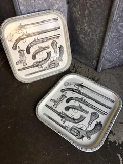 Vintage pair of Piero Fornasetti pair of toleware trays ‘Pistole’ circa 1970’s
