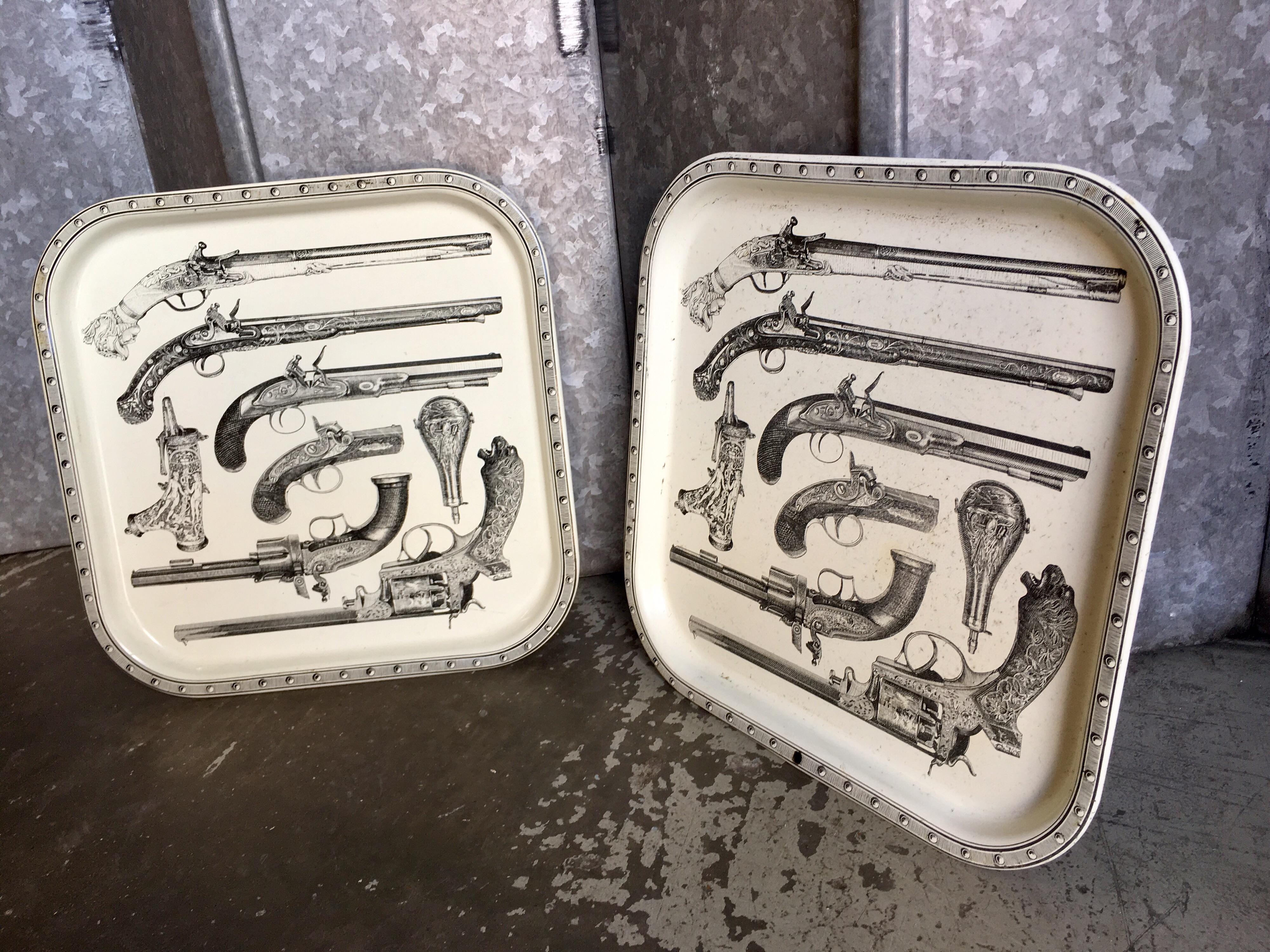 Machine-Made Vintage pair of Piero Fornasetti pair of toleware trays ‘Pistole’ circa 1970’s For Sale