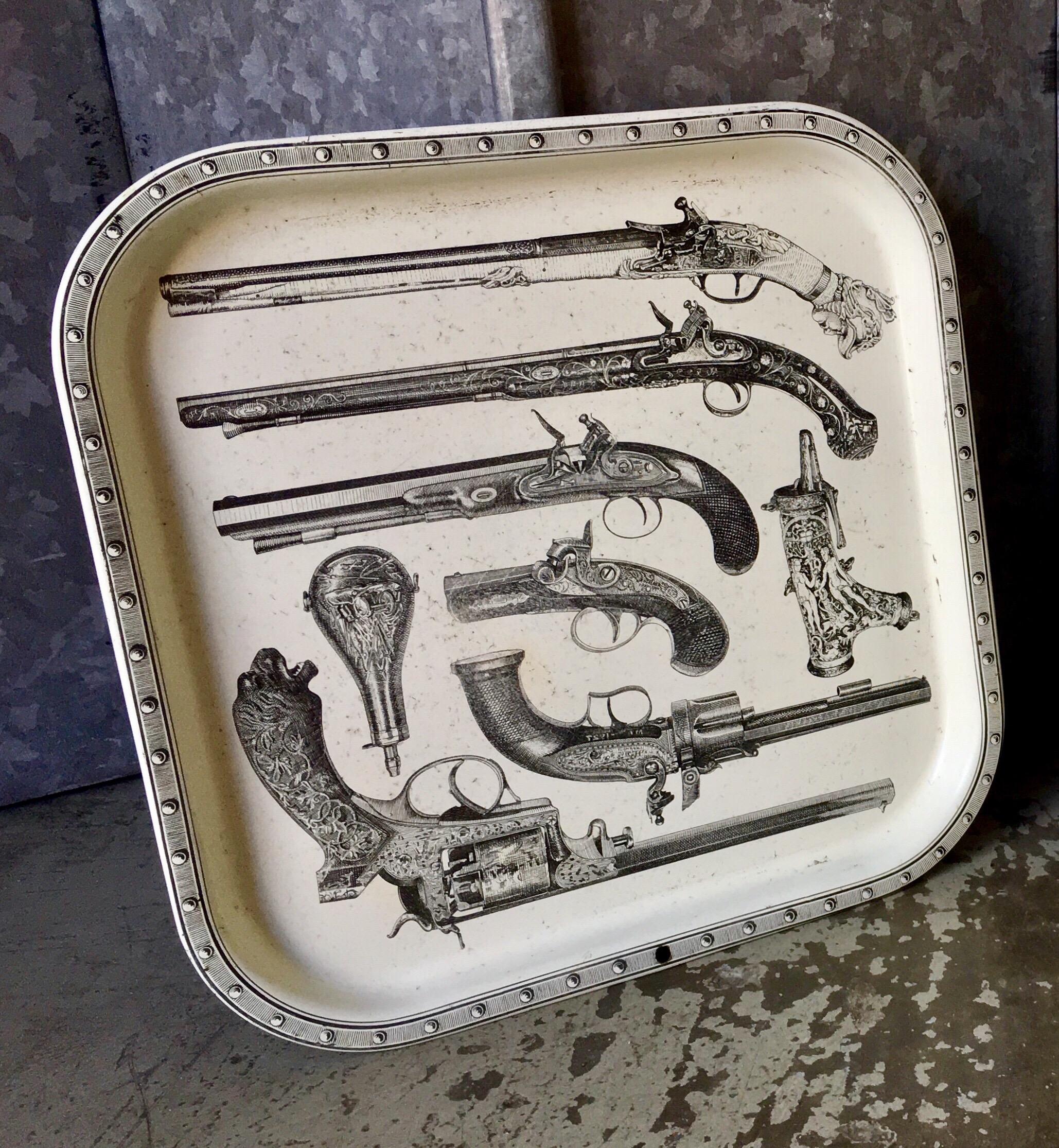 Vintage pair of Piero Fornasetti pair of toleware trays ‘Pistole’ circa 1970’s In Fair Condition For Sale In London, GB