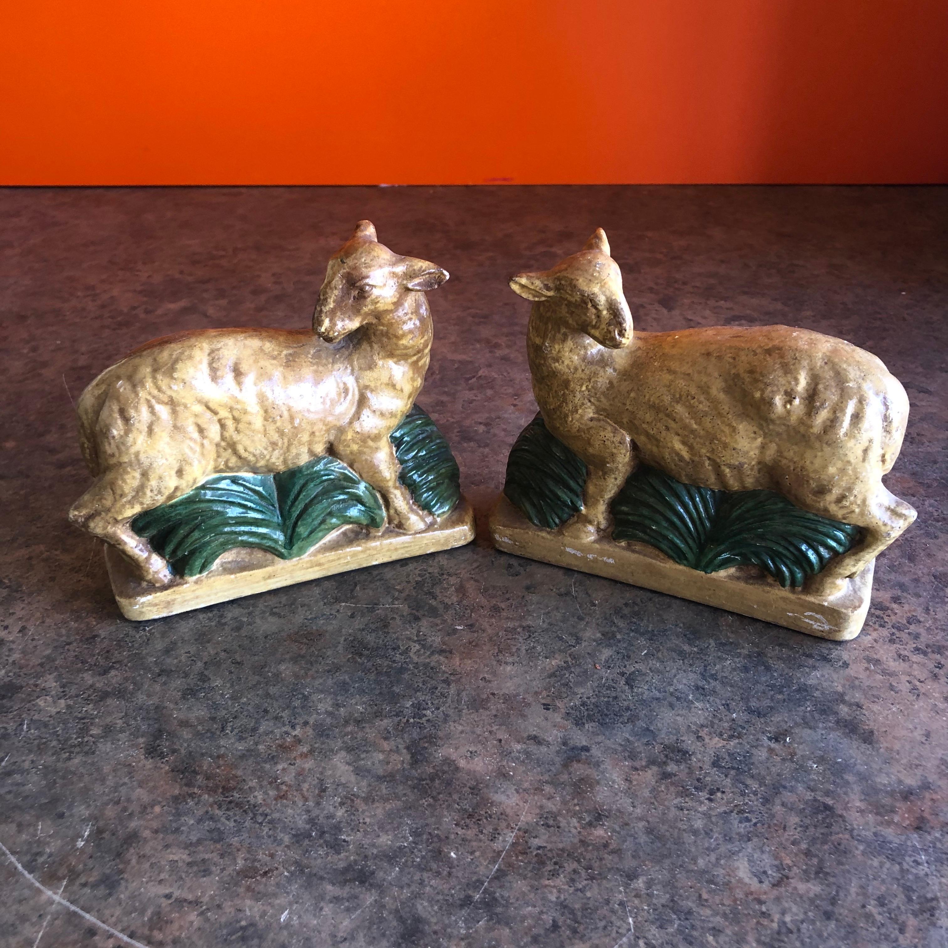 Vintage pair of plaster lamb / sheep bookends by Borghese of Italy, circa 1970s.