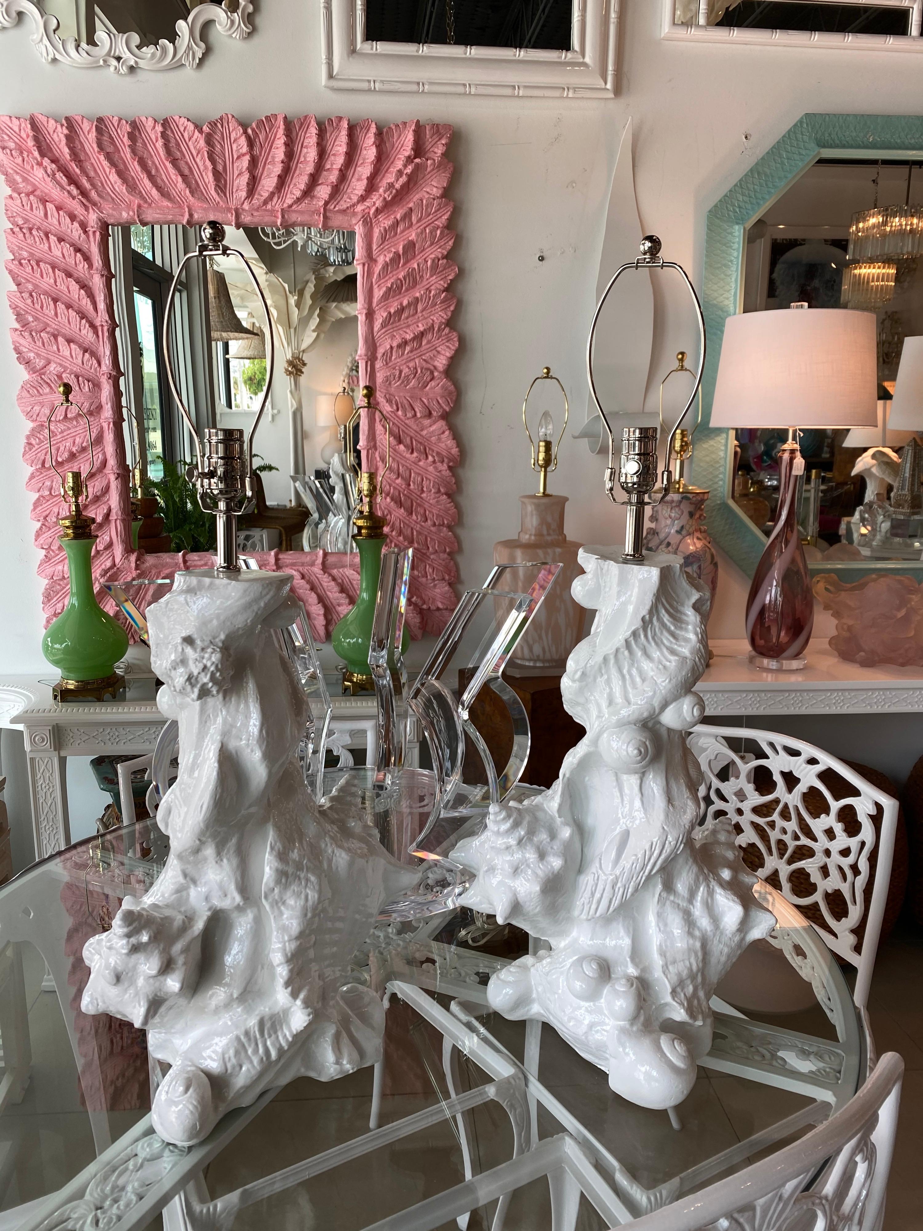 Lovely pair of vintage plaster seashell table lamps by Sirmos. These have been professionally wired, all new nickel hardware, 3 way sockets. These have been newly lacquered to complete the fresh look of these Classic lamps. No chips or breaks.