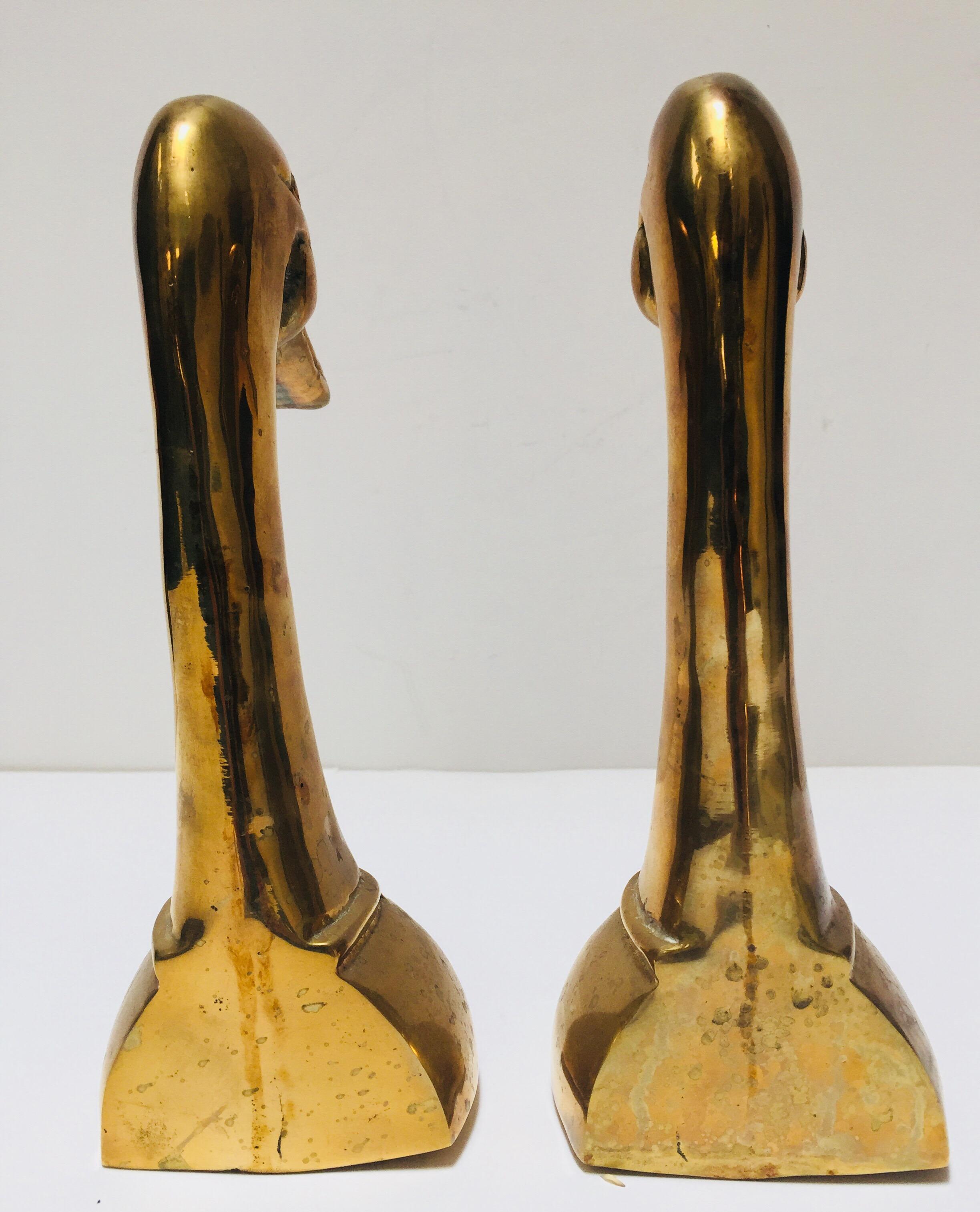 Mid-Century Modern Vintage Polished Cast Brass Duck Bookends, circa 1950 For Sale