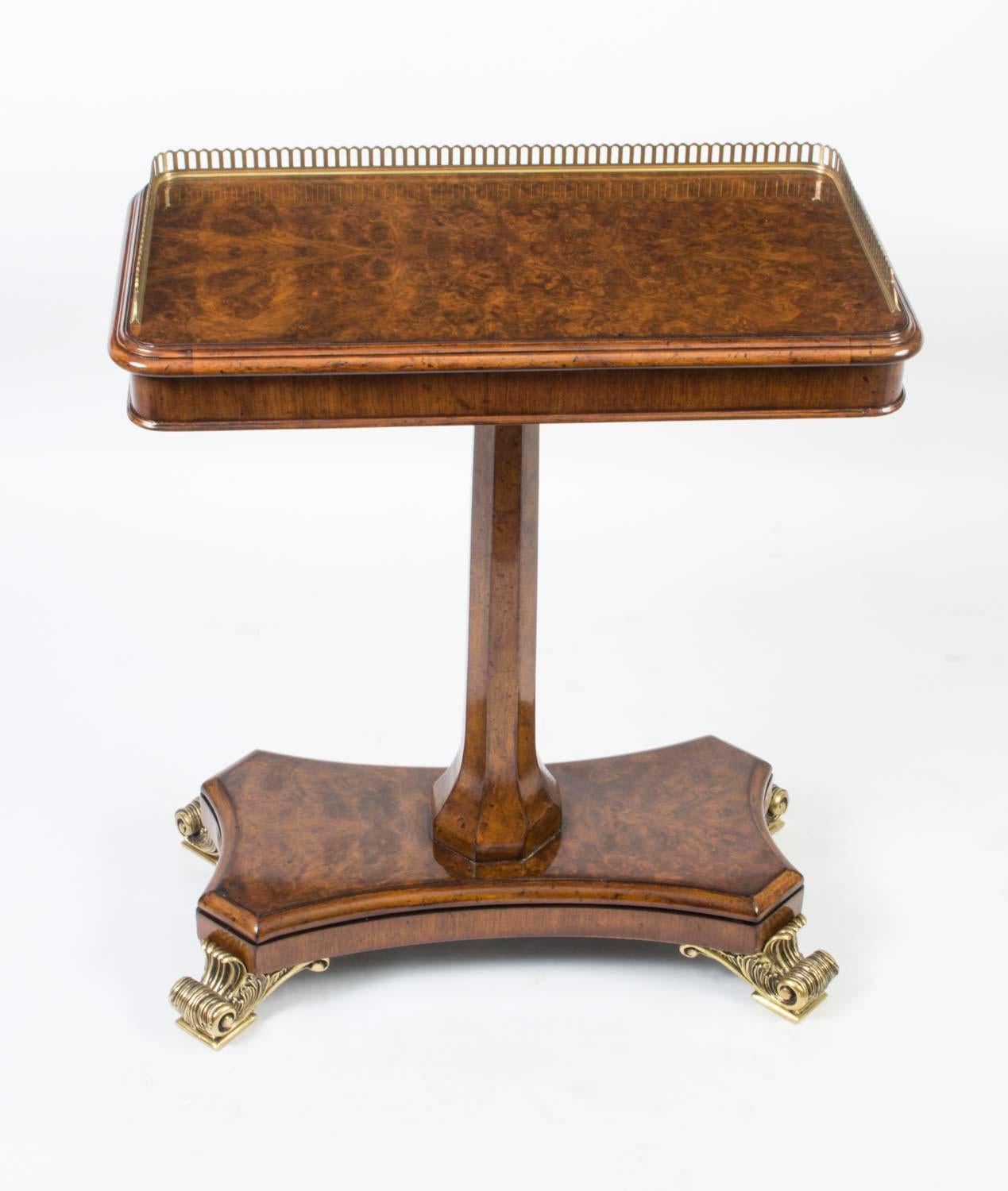 This is a handsome pair of  Vintage Regency Revival occasional tables dating from the late 20th Century.

They have been masterfully created by in gorgeous burr walnut with  brass galleries and elegant ormolu feet.

Perfect at the ends of a sofa as 