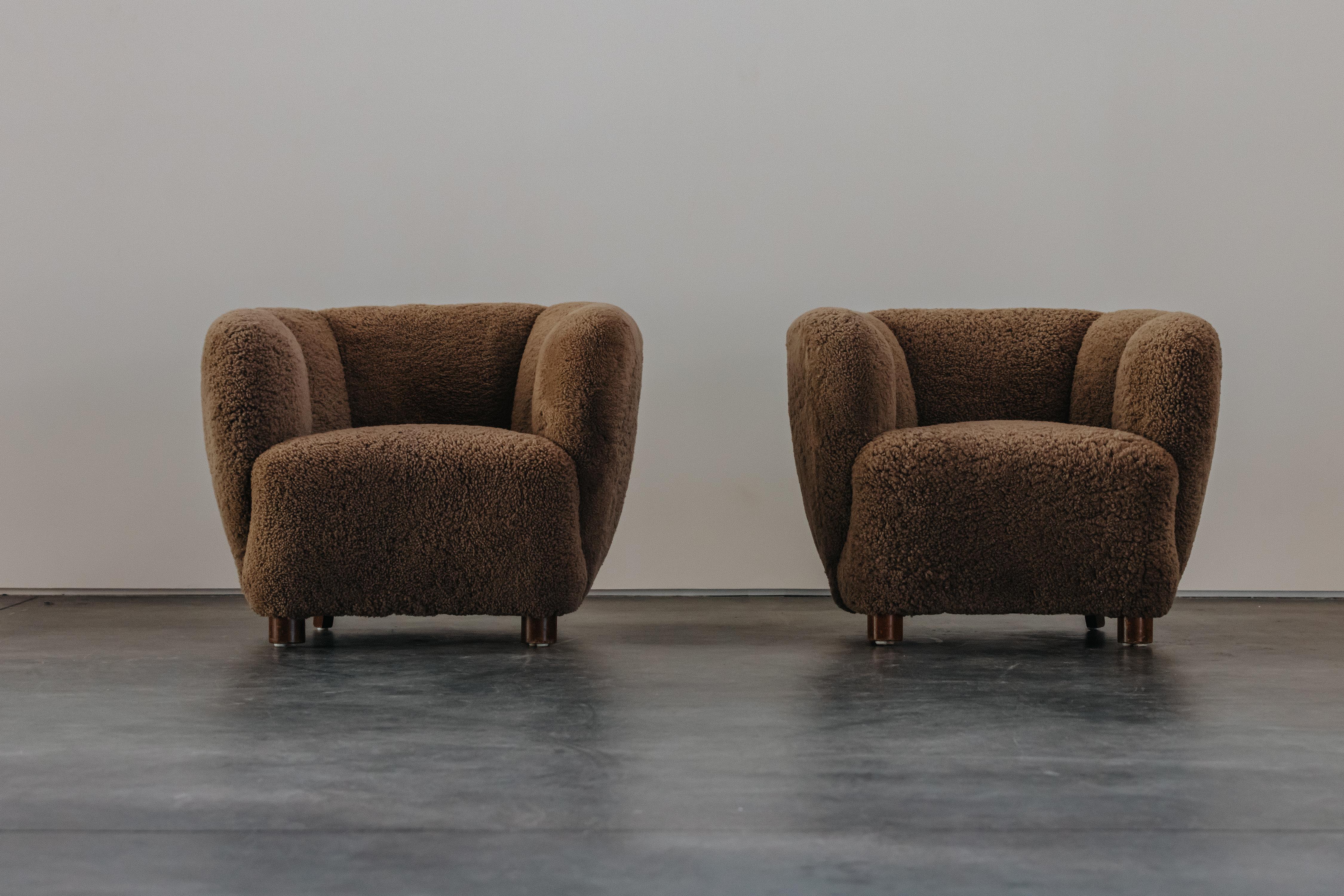 Vintage Pair Of Shearling Lounge Chairs From Denmark, Circa 1960.  Comfortable pair of lounge chairs later reupholstered in super soft grey brown shearling.
