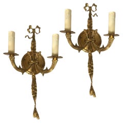 Coppia di lampade da parete in ottone massiccio vintage.