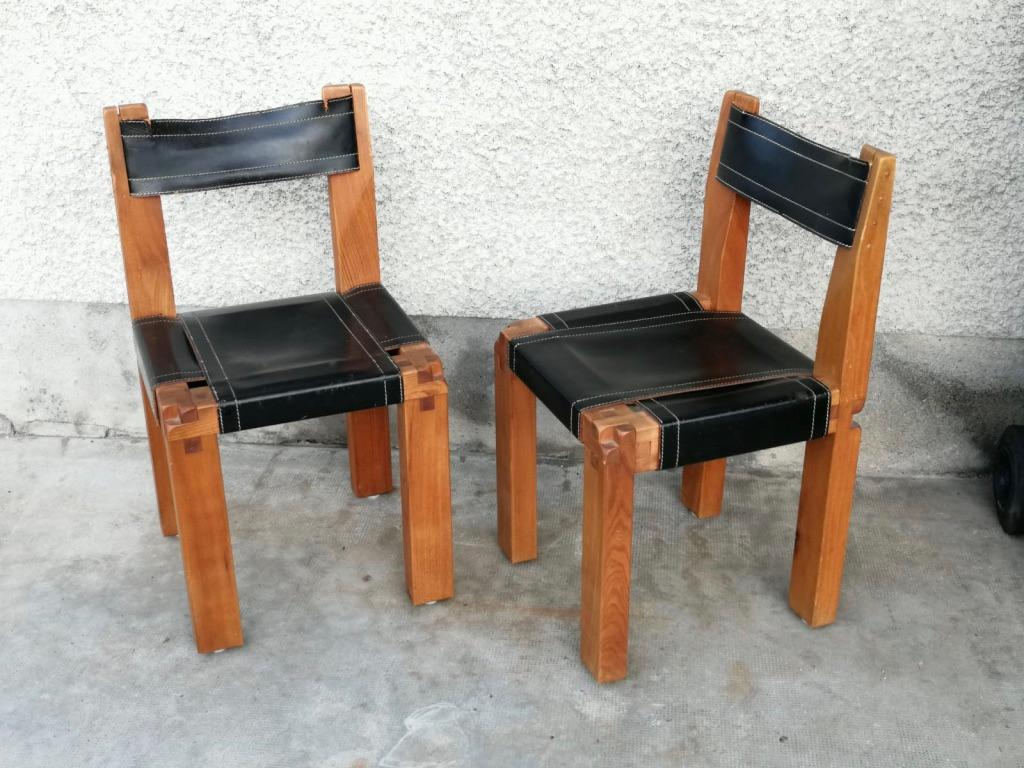 Paire de chaises S11 en orme massif et cuir noir par Pierre Chapo, France ca. 1960s.
Bois en parfait état, cuir déchiré sur le dossier (photos).
 