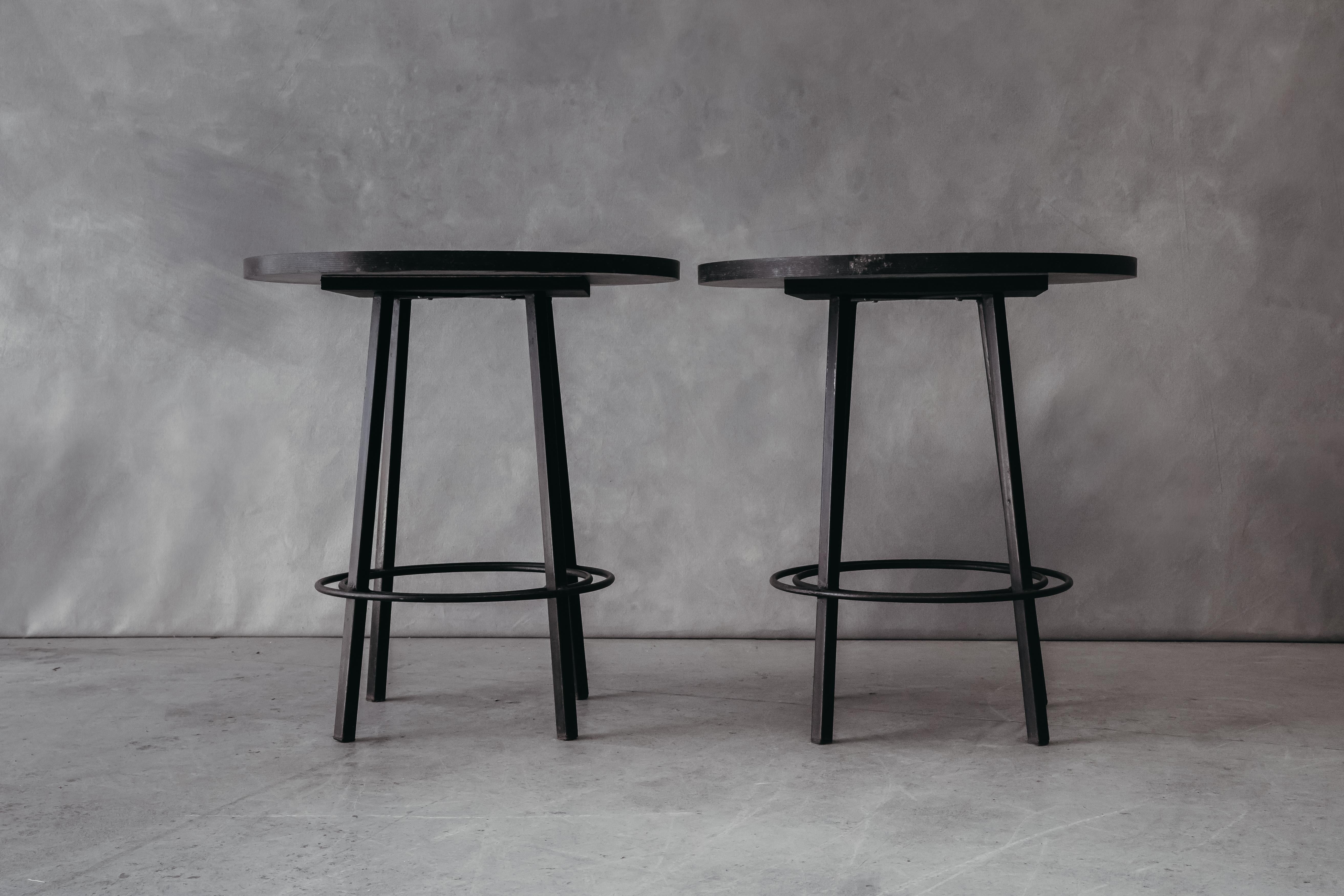 Vintage Pair Of Stone Bistro Tables From France, circa 1970. Solid bluestone top on a metal base.