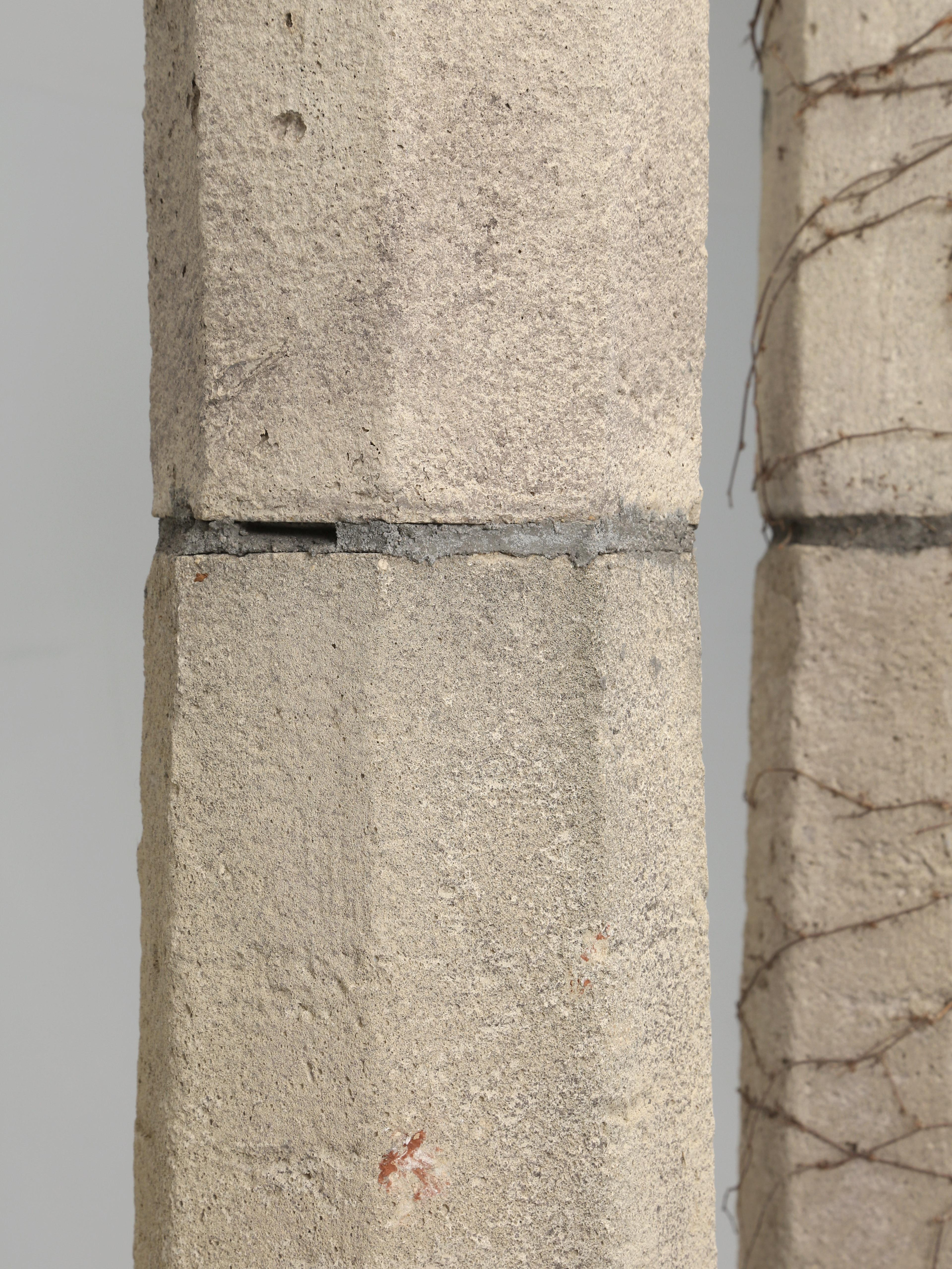 Late 20th Century Vintage Pair of Stone Composition Columns from England Made from Crushed Stone For Sale