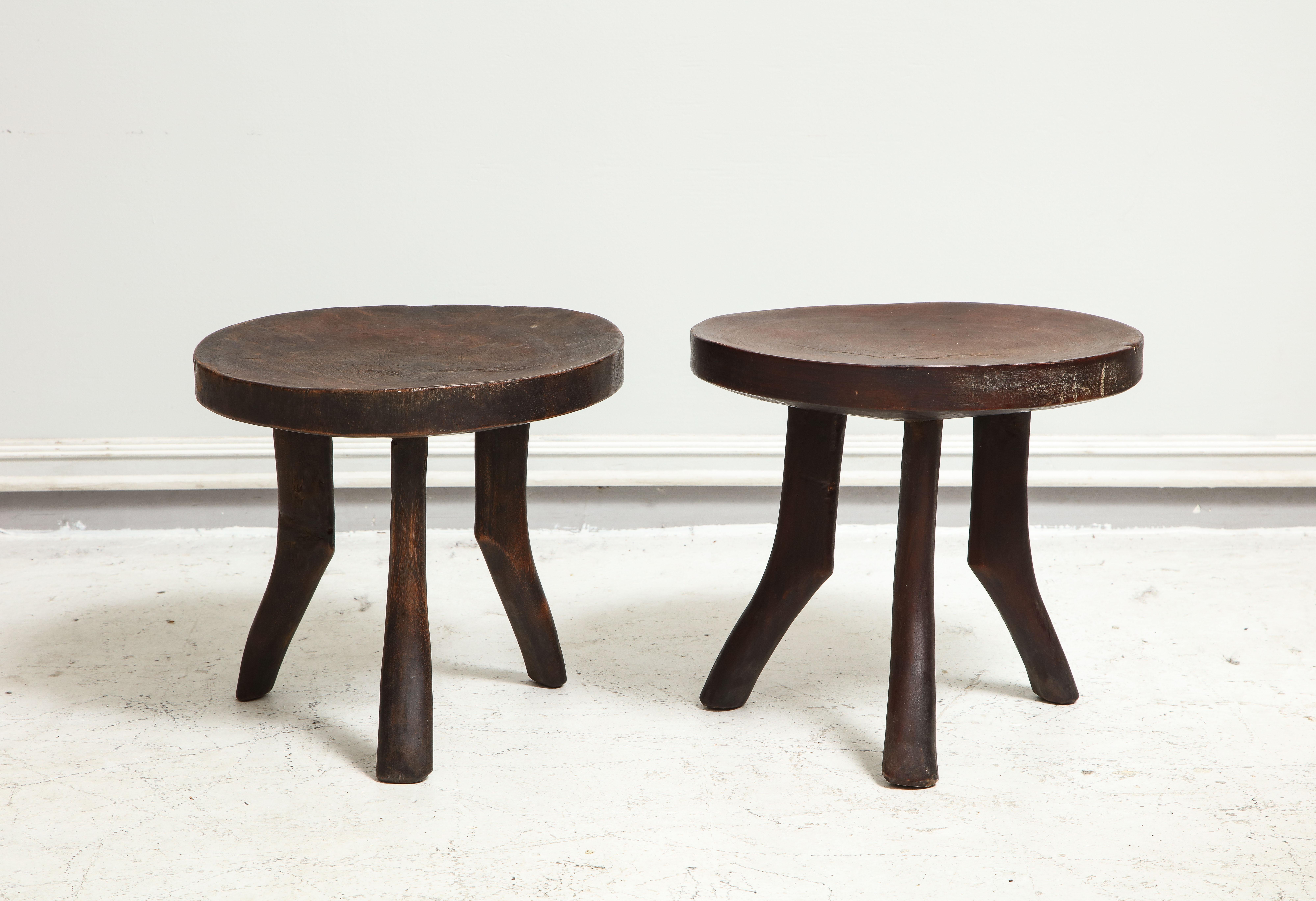 Pair of vintage stools in the Perriand manner.