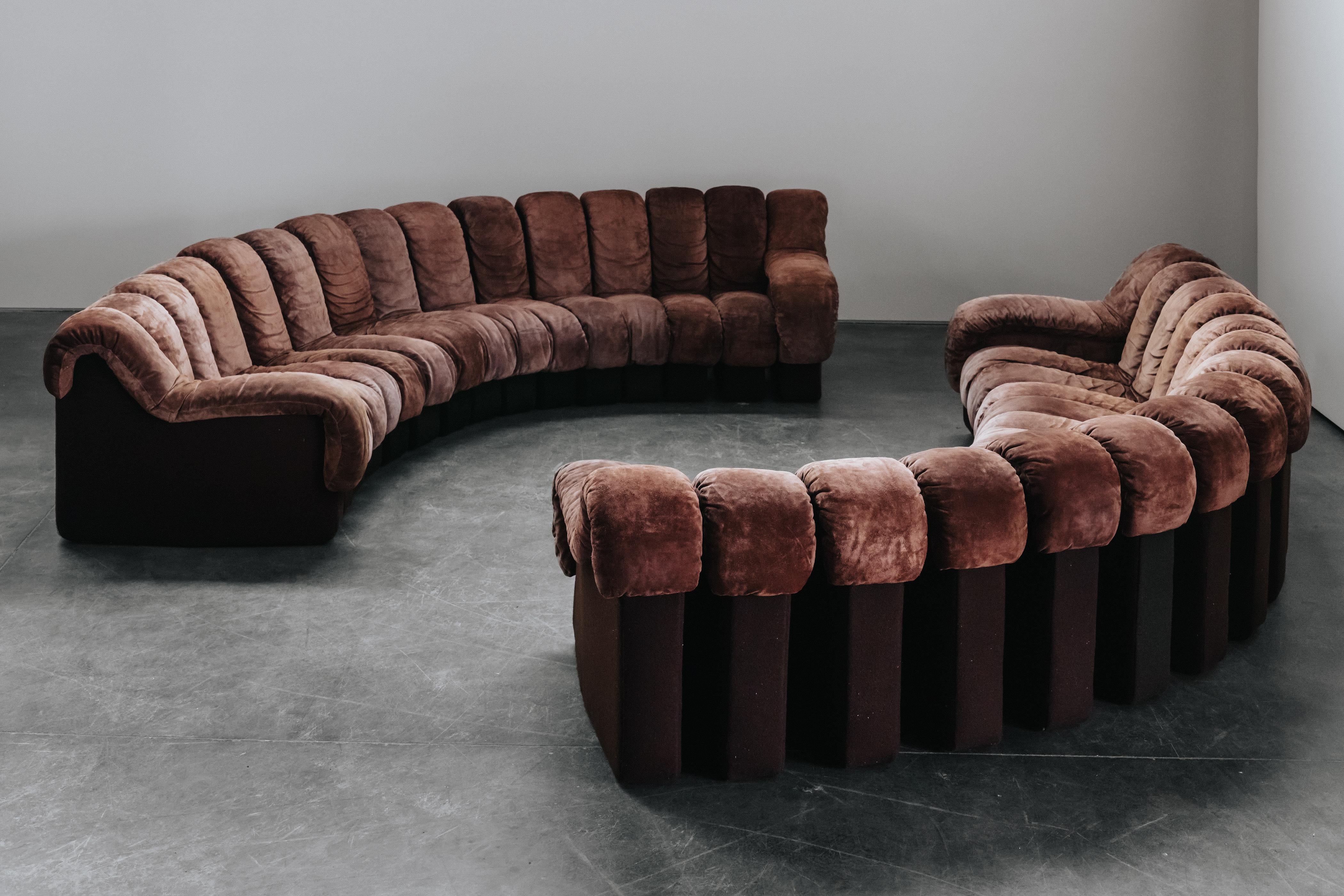 Vintage Pair Of Suede De Sede DS-600 Nonstop Modular Sofas, Circa 1970.  Rare XL model containing 30 pieces total, that can make one large sofa or a matching pair.  Original brown suede upholstery with very light wear and use.  Excellent condition.