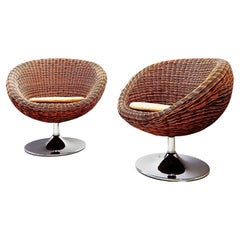Vintage Pair of Swiveling Wicker Chairs