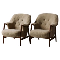 Vintage Pair of Teak and Shearling Lounge Chairs from Denmark, circa 1960
