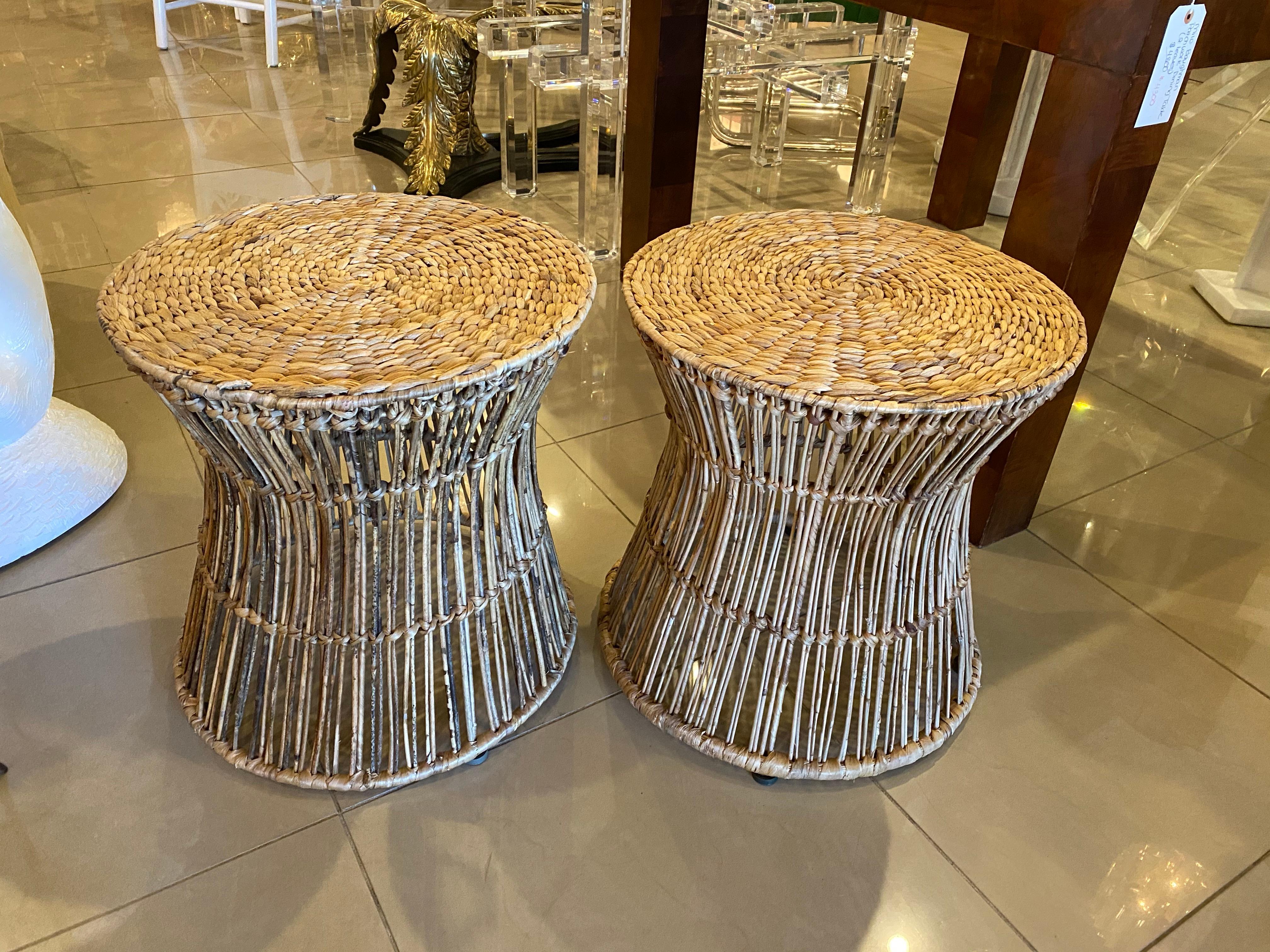 Lovely pair of vintage rattan and seagrass stools, ottomans or benches. No broken or damages pieces of rattan or seagrass.