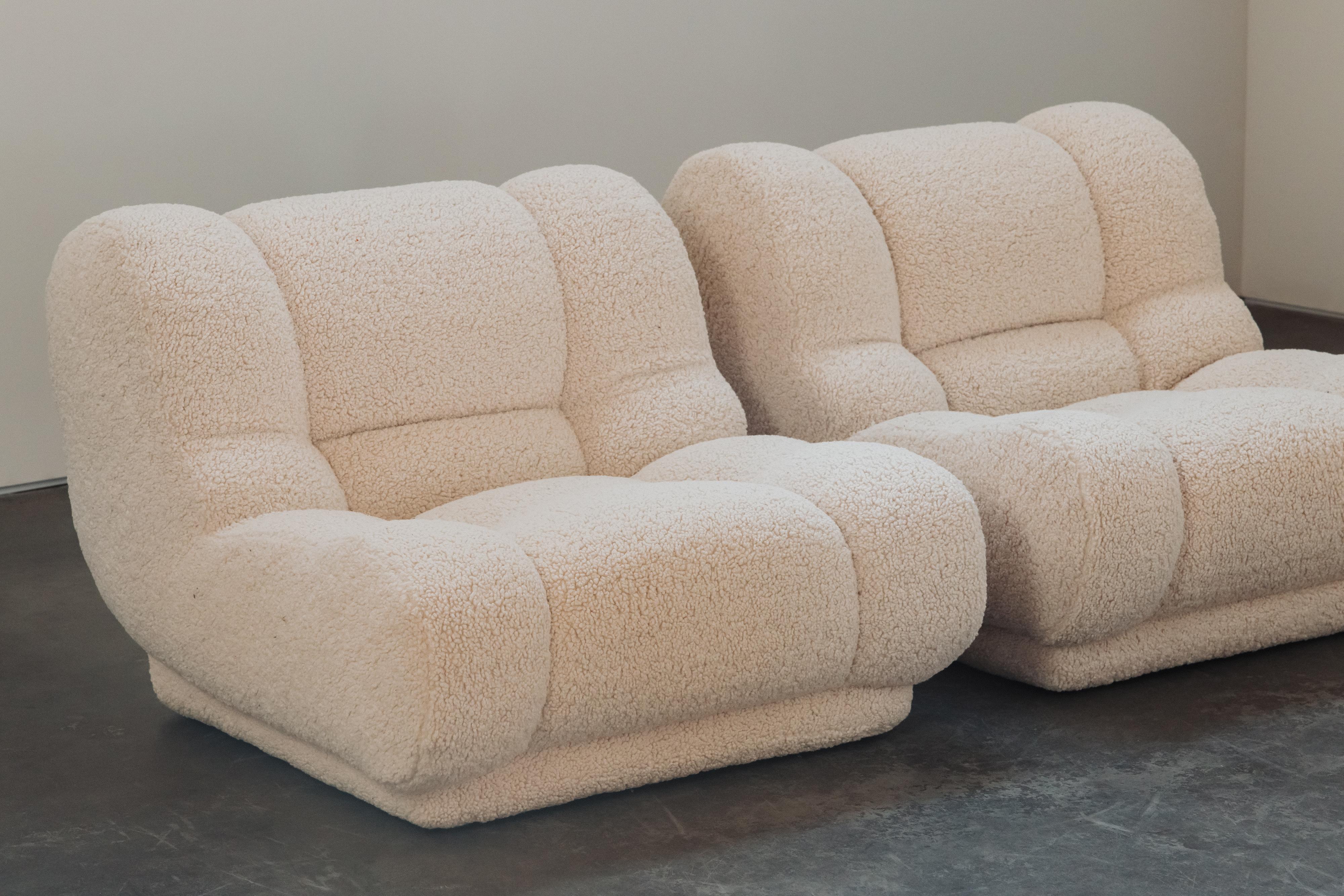 Vintage Pair of Upholstered Lounge Chairs From Italy, Circa 1960.  Very comfortable model upholstered in a soft faux shearling upholstered.  Excellent condition.