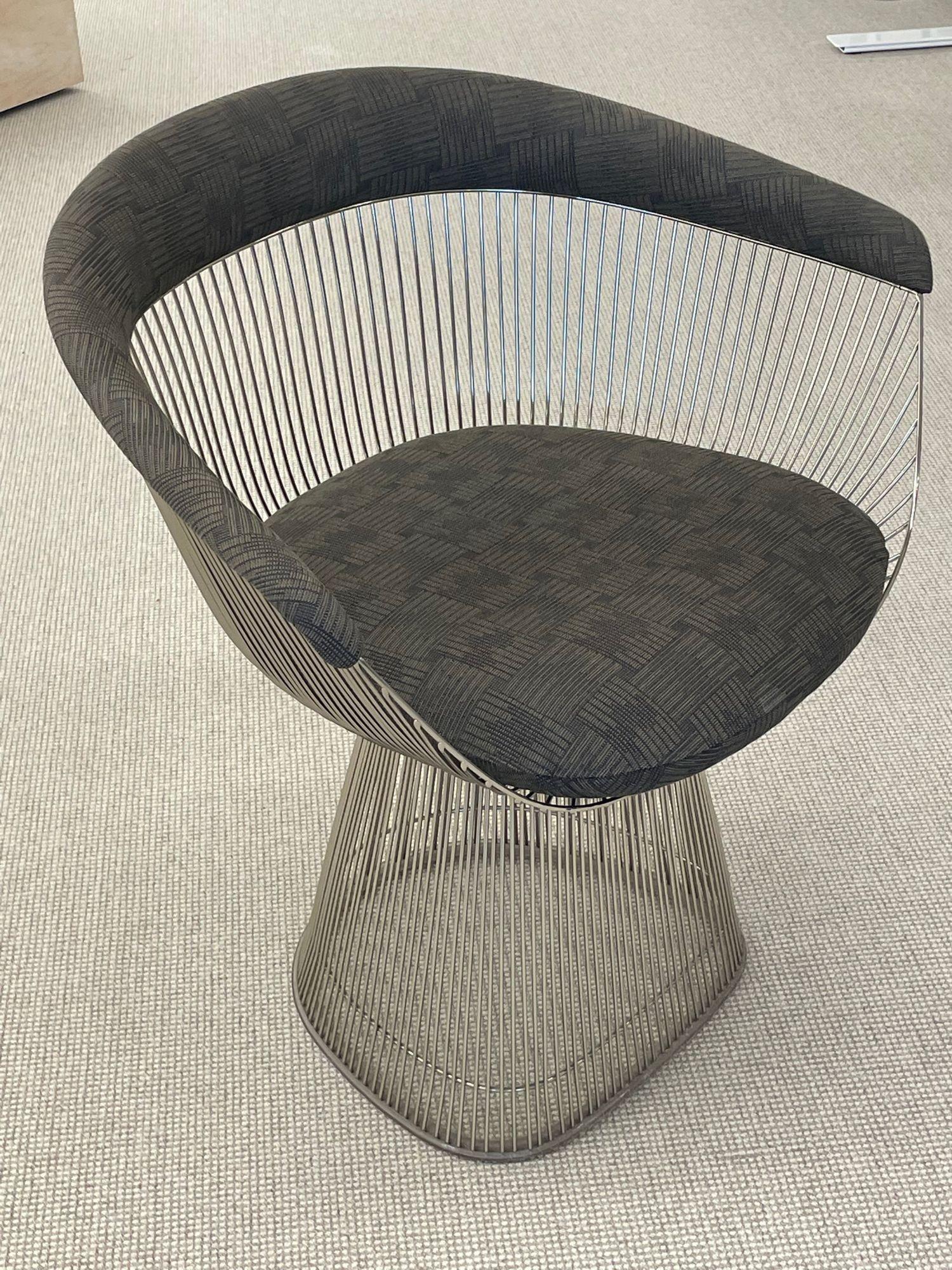 Vintage Pair of Warren Platner for Knoll Arm / lounge chairs, Signed, American
 
Pair of iconic mid-century lounge or arm chairs having a later abstract grey upholstery and the original Knoll labeling on it's underside. Matching circular dining