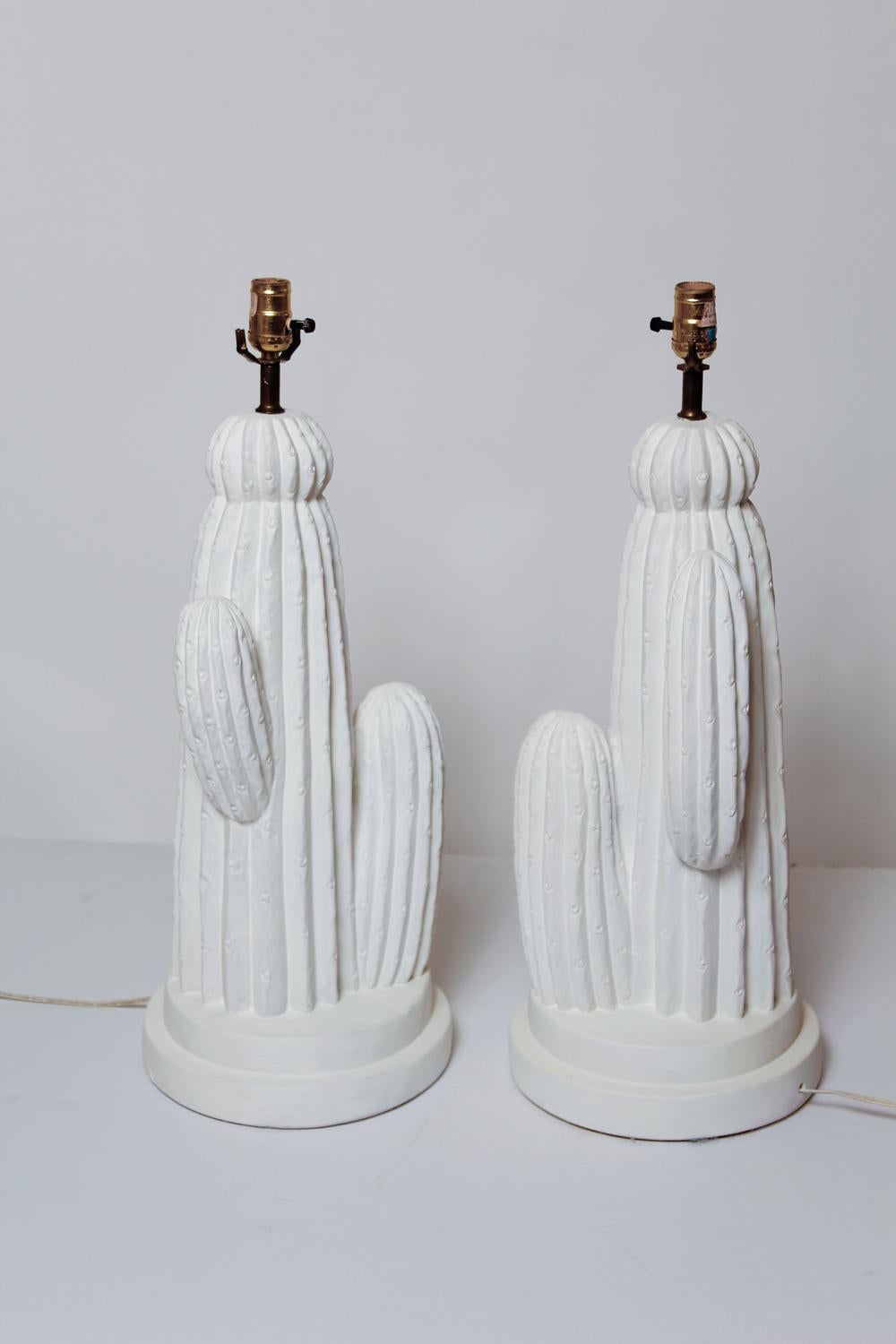 Desert-chic chalk white cast plaster cactus lamps, circa 1975. Height measurement below is to top of socket.