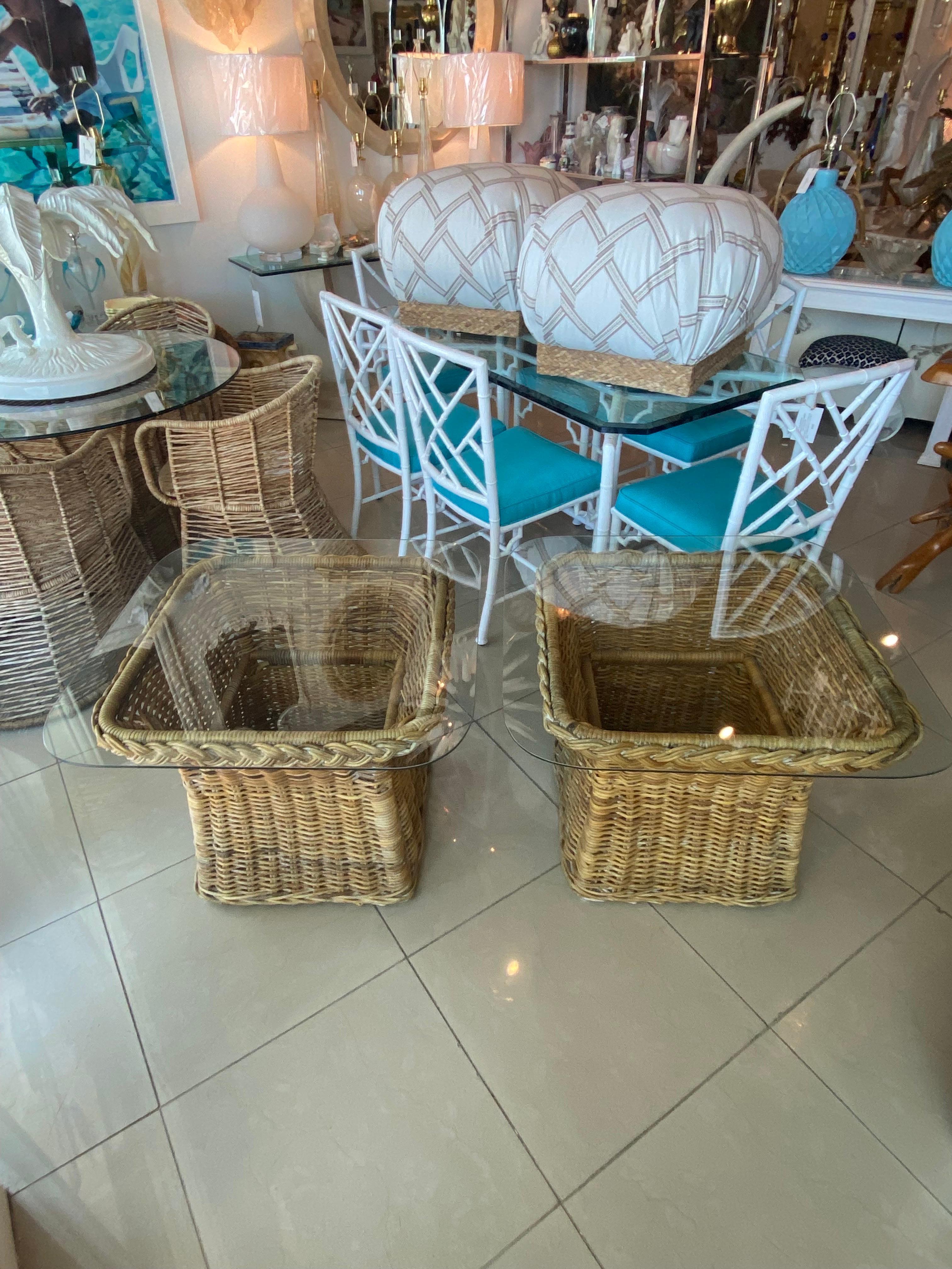 Lovely vintage pair of Wicker Works braided side end tables with new glass top. Glass tops have been newly cut. Natural rattan original finish with color variation. Glass measures 30 x 30 with rounded corners. Table base measures 25.5 W x 25.5 D x
