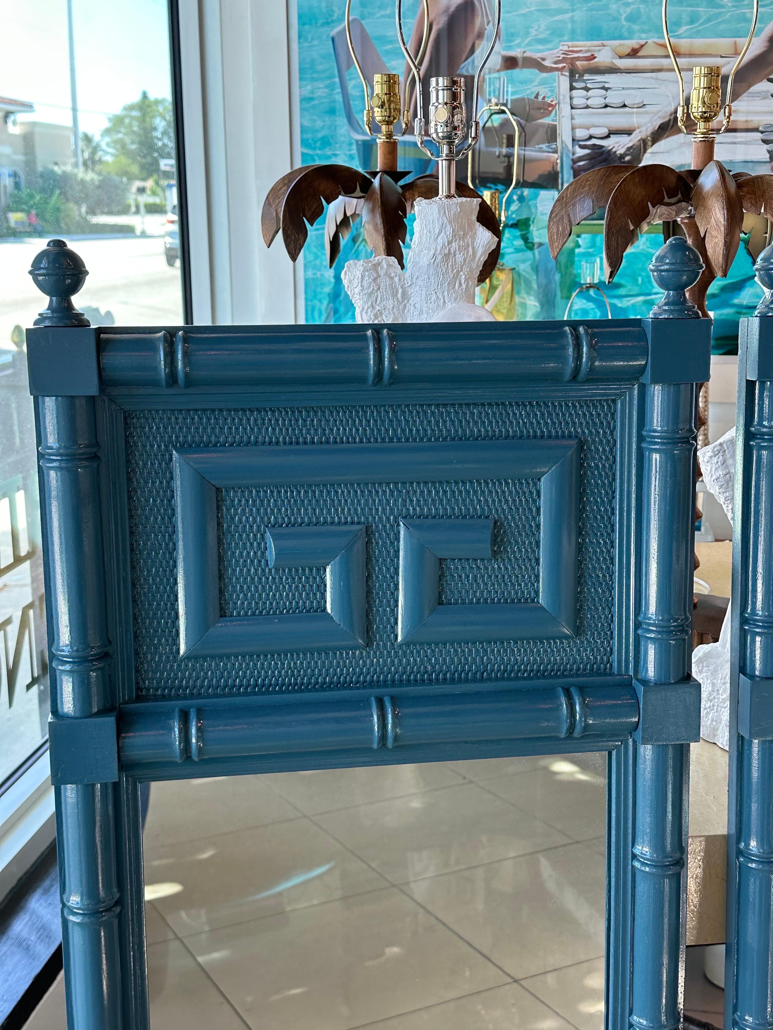 Lovely pair of vintage wood, faux bamboo with Greek key motif. Newly lacquered in a blue gloss. Mirrors are original. Comes ready to hang. Dimensions are 49.5 H x 20 W x 1.5 D.