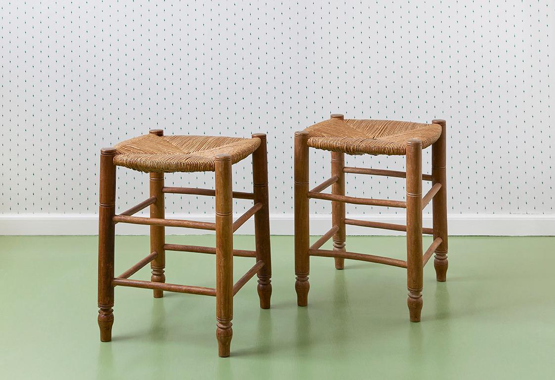 Stools

France, 1950's

A pair of wooden stools with woven rush seats.