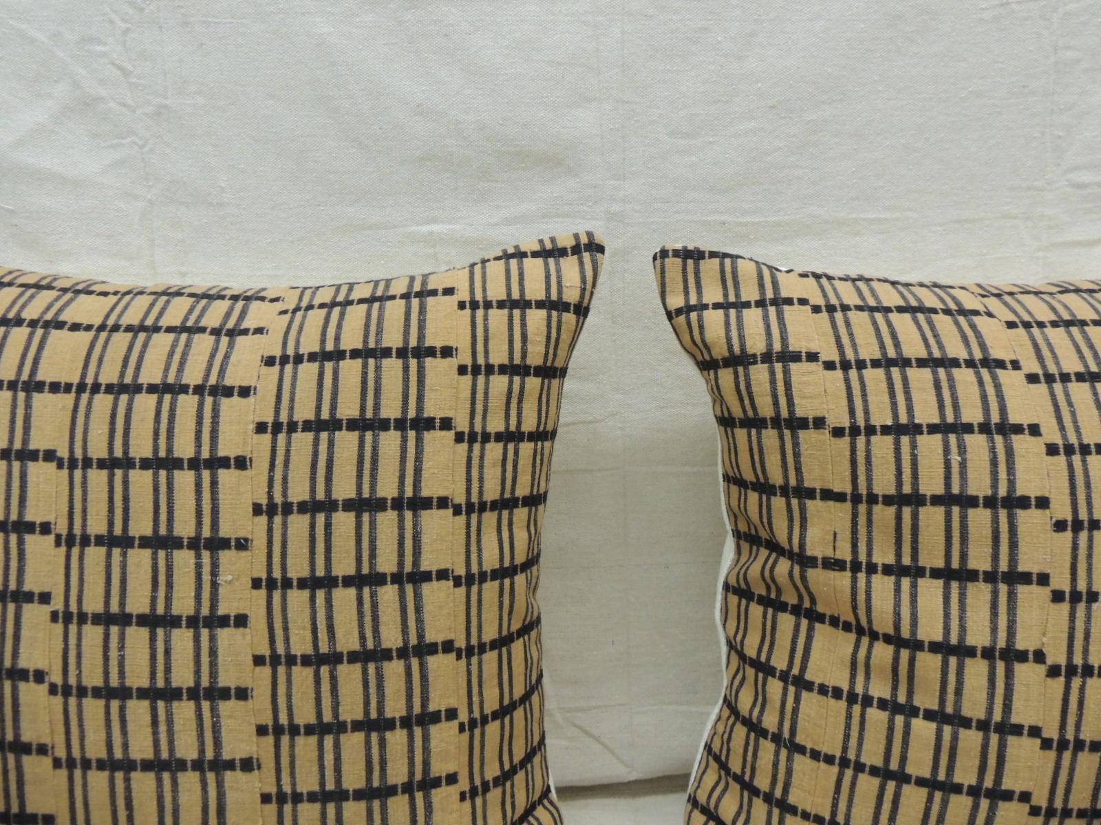 Vintage pair of yellow and dark blue African Stripweaves square decorative pillows
with heavy woven cotton/linen backings.
Decorative pillow handcrafted and designed in the USA. 
Closure by stitch (no zipper closure) with custom made pillow