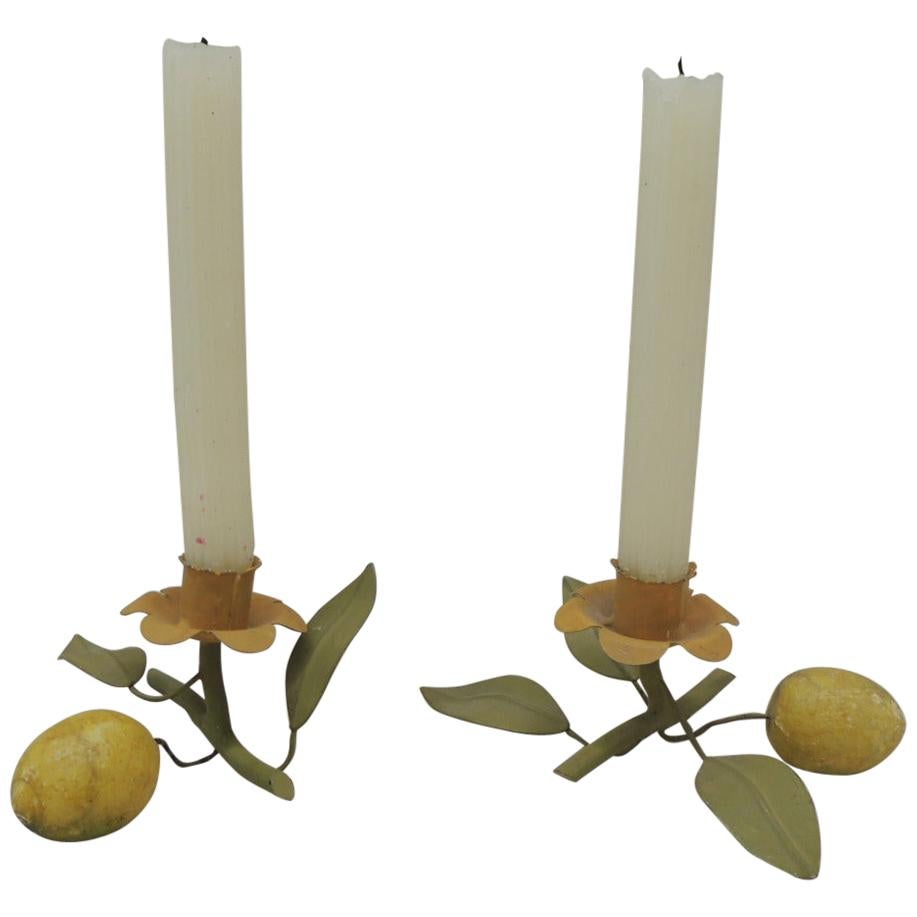 Vintage pair of green and fruit candleholders
