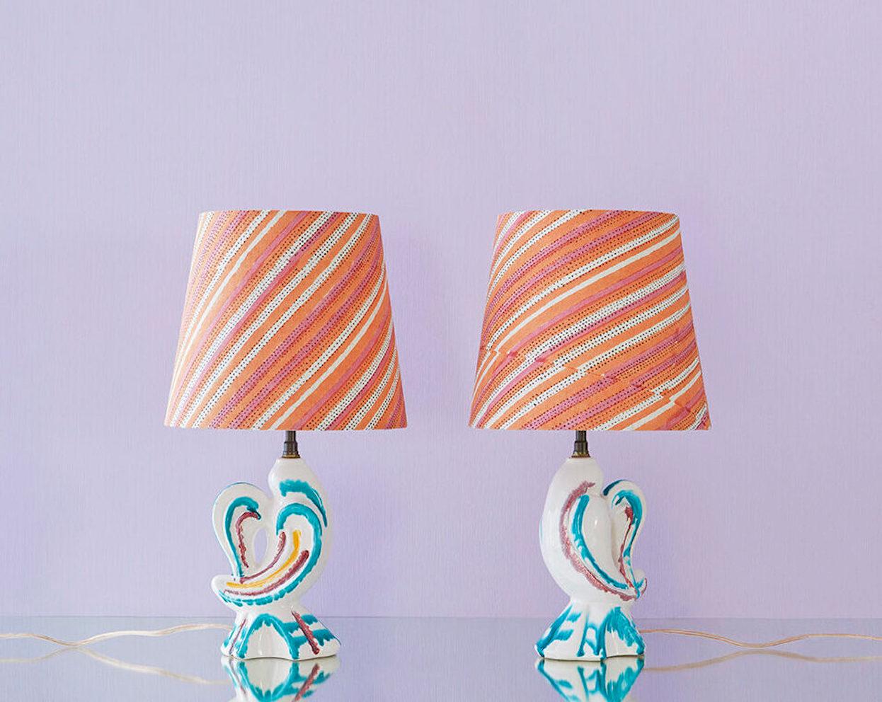 France, 1950's

A pair of zoomorphic ceramic table lamps with multicolored glaze and customised shade by The Apartment.

Measures: H 39.5 x Ø 22 cm.
