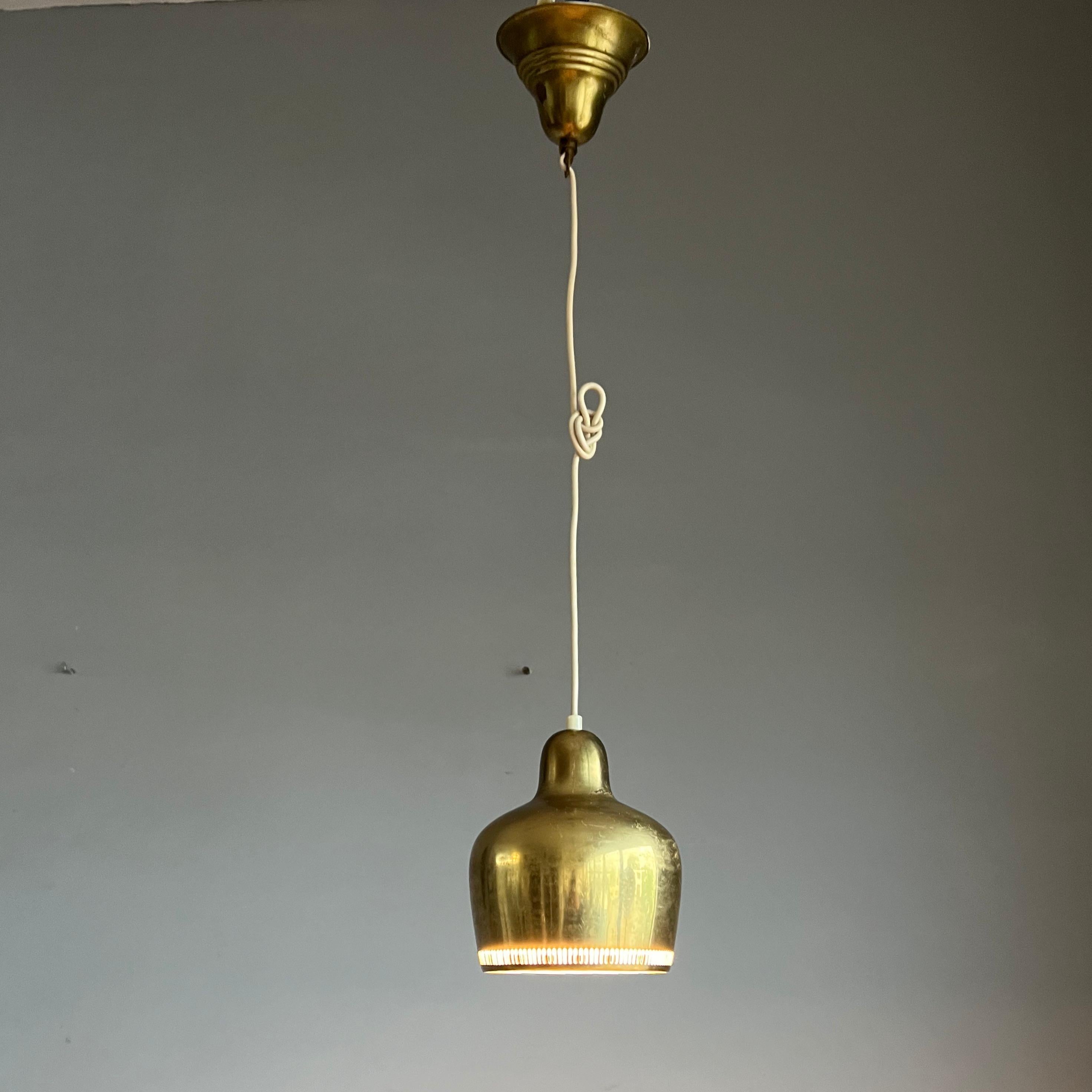 Cast Vintage Pair Original Mid-Century Brass Pendant Lights by Alvar Aalto, 1950s