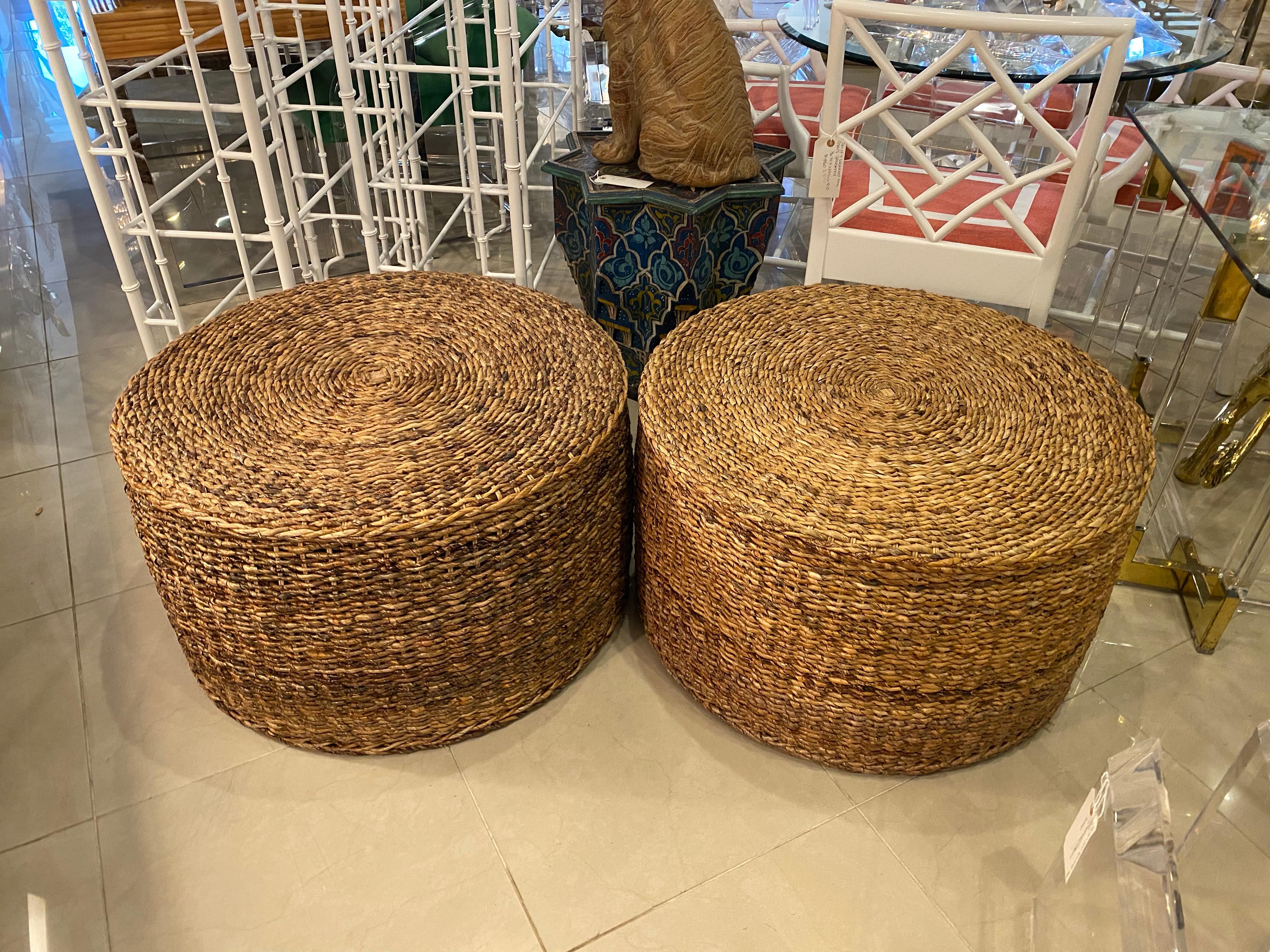 Lovely pair of vintage, oversized seagrass ottomans, benches, coffee tables. These are very versatile and can be used in a number of ways. We can even have a cushioned top made for the top (tufted or not) at an additional cost. Great inside, on a