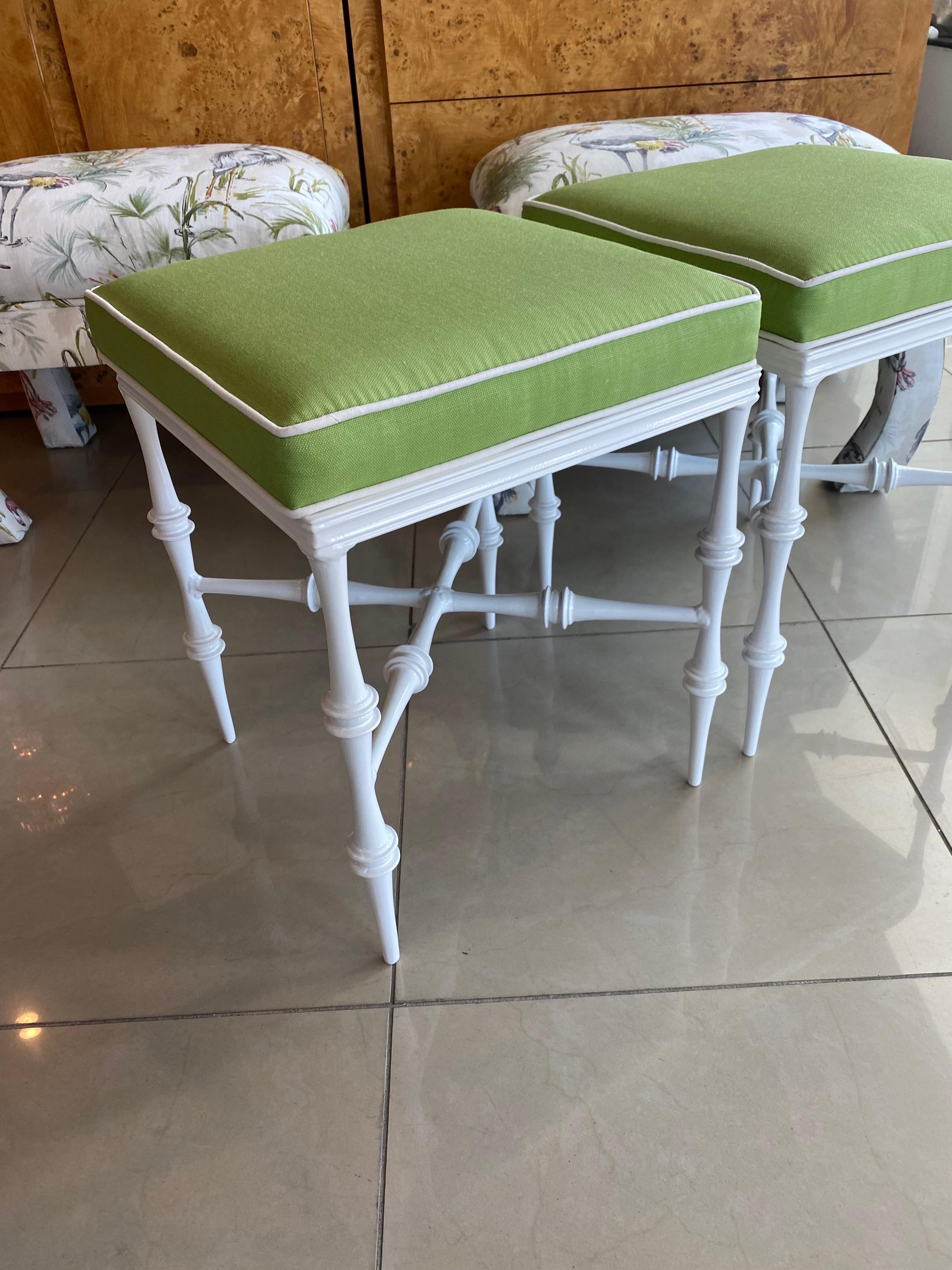 Vintage pair of Phyllis Morris metal outdoor patio or indoor stools benches. These have been professionally powder coated in a fresh white. Upholstered in a Sunbrella fabric. Dimensions: 16 W x 16 D x 19.5 H. Please let me know if you would like an