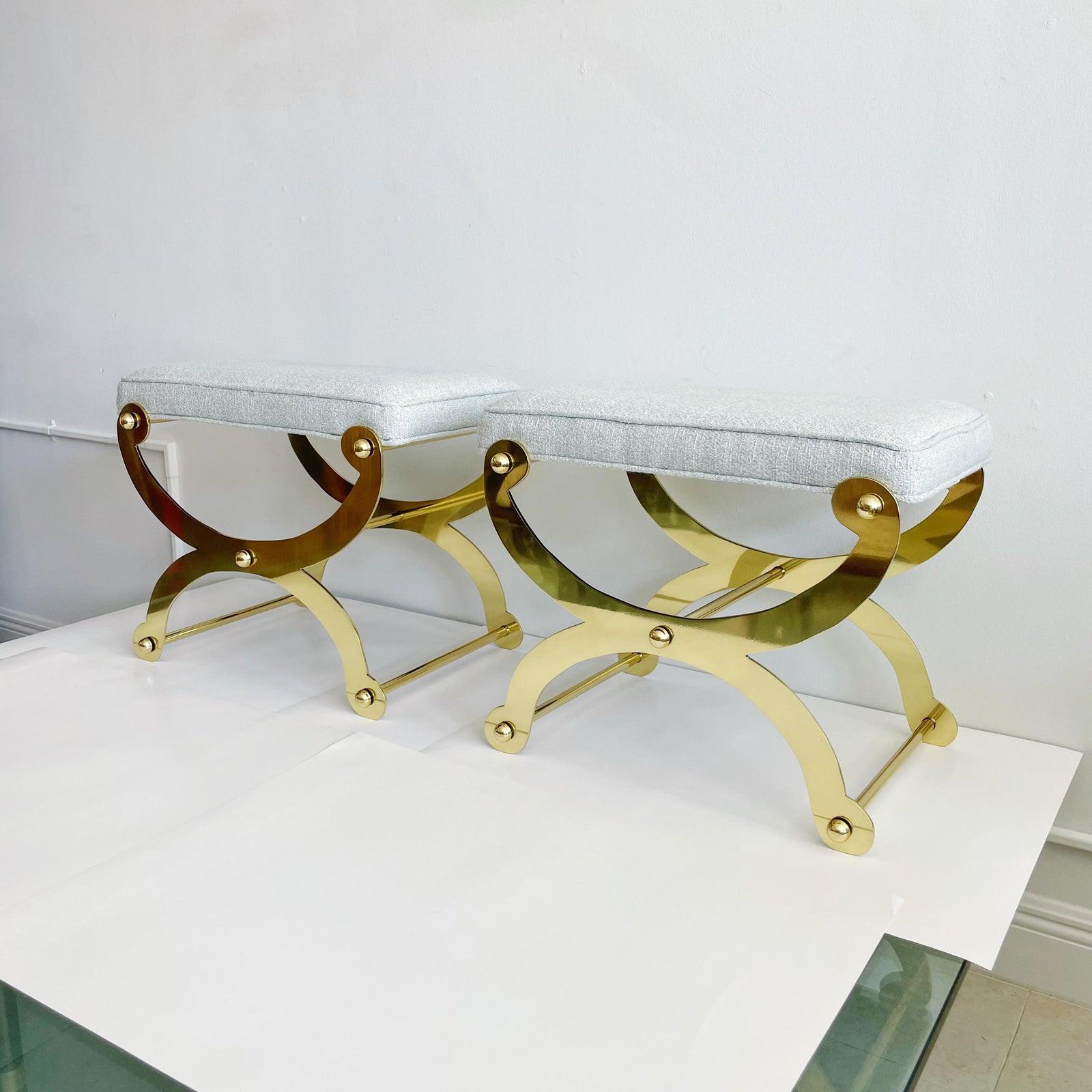 Pair of vintage solid brass x-frame benches stools by Maison Jansen. Recently professionally polished and lacquered and reupholstered.