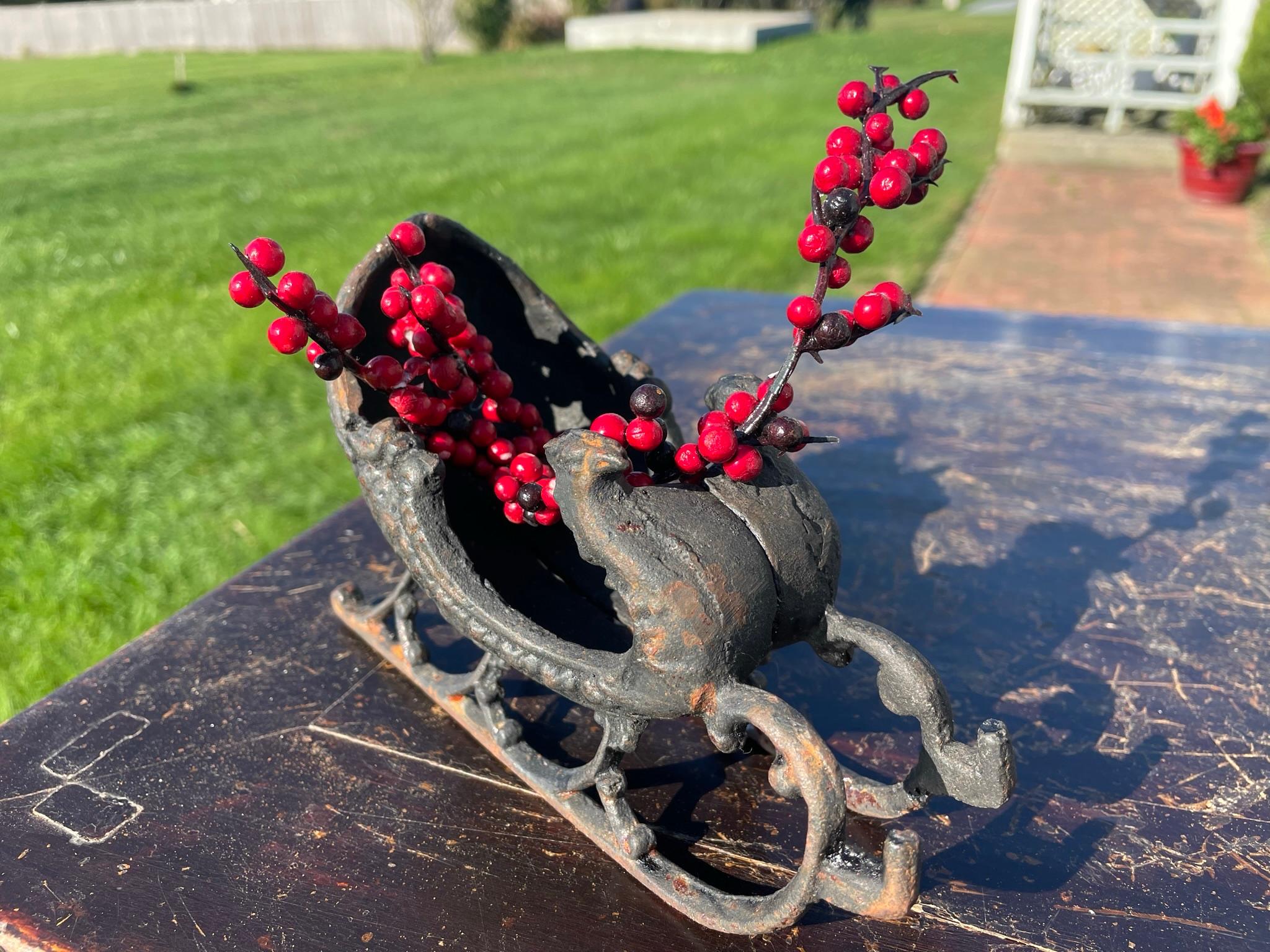 Cast Vintage Pair Santa Christmas Sleigh Sculptures With Bird Head Finials, 1930s For Sale