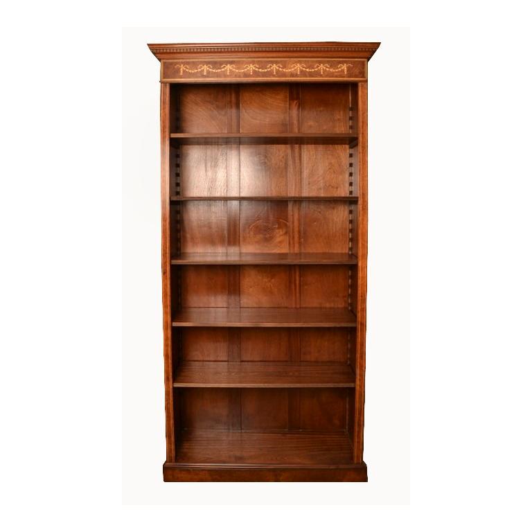 Il s'agit d'une magnifique paire de bibliothèques ouvertes de style Sheraton avec des étagères réglables, datant de la fin du 20ème siècle.

Elles sont fabriquées en ronce de noyer et présentent de magnifiques incrustations de bois satiné avec des